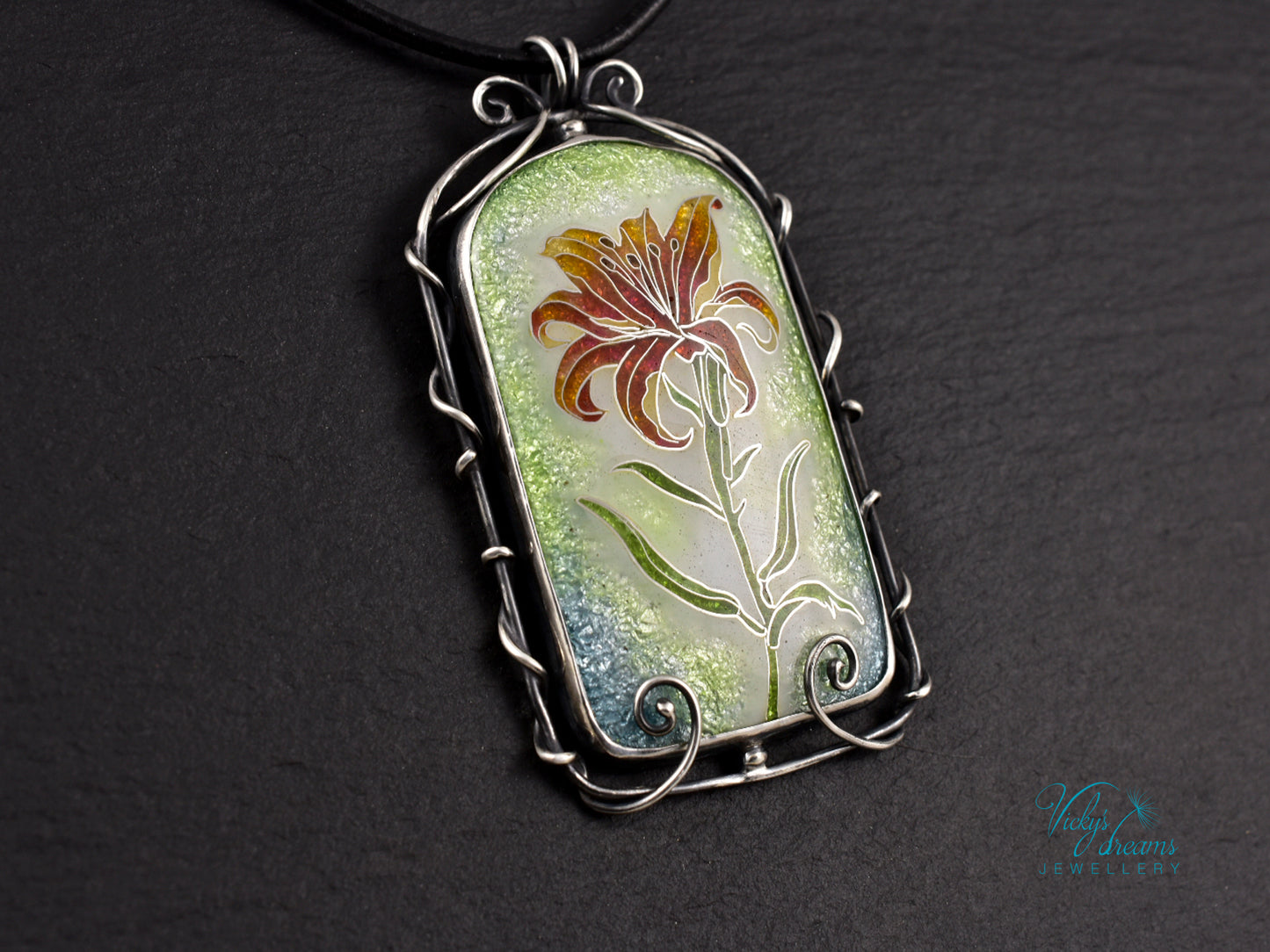 Handmade cloisonné fire lily enamel pendant on sterling silver with leather cord