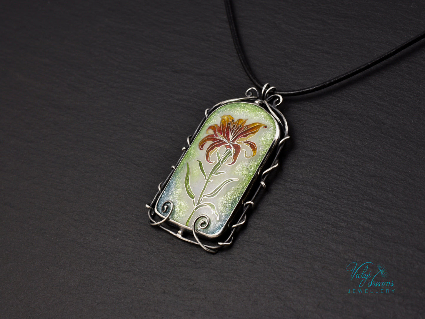 Handmade cloisonné fire lily enamel pendant on sterling silver with leather cord