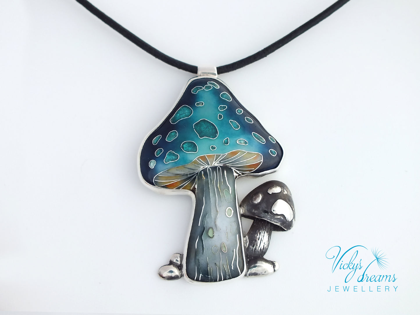 Mushroom-shaped pendant on a black cord against a white background, with 'Vicky's Dreams Jewellery' branding.