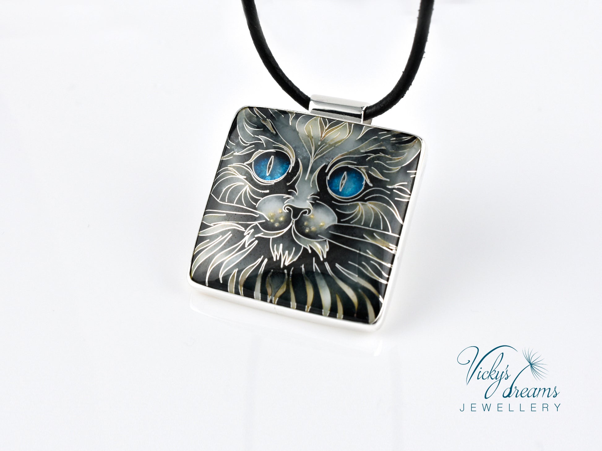 Handmade cloisonné blue-eyed cat pendant necklace in sterling silver