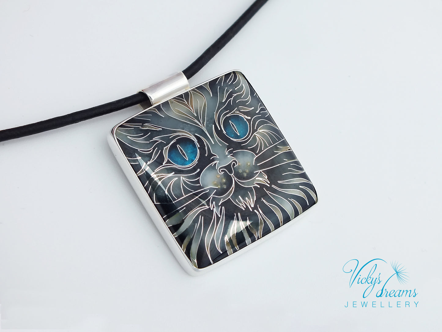 Handmade cloisonné blue-eyed cat pendant necklace in sterling silver