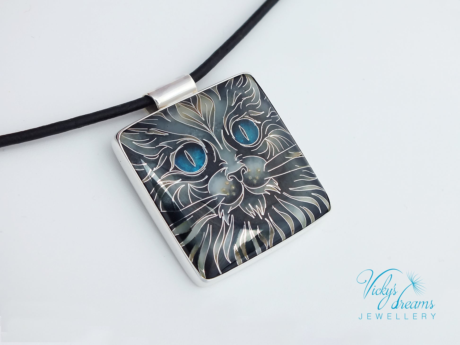 Handmade cloisonné blue-eyed cat pendant necklace in sterling silver