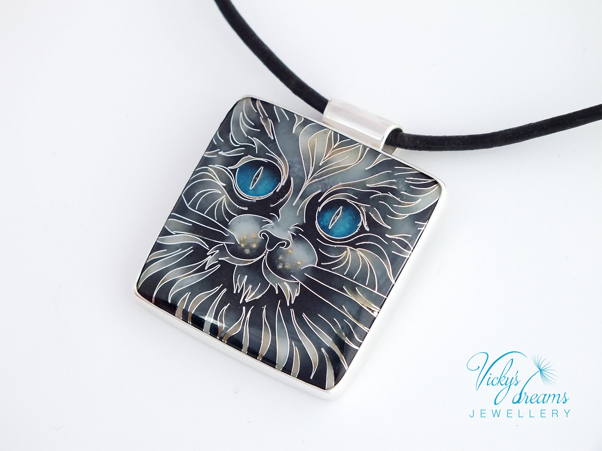 Handmade cloisonné blue-eyed cat pendant necklace in sterling silver