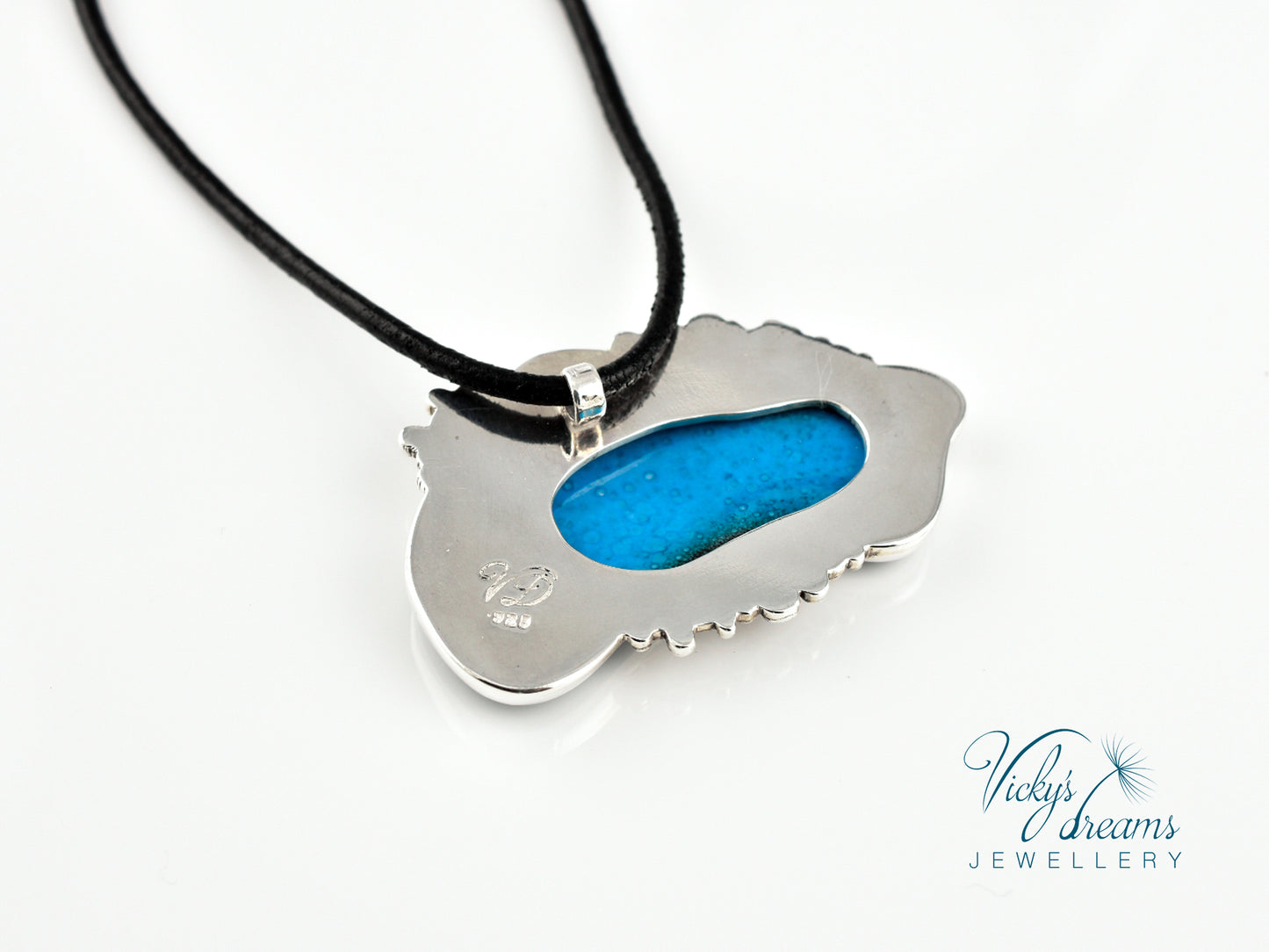 Silver pendant with blue interior on a white background, branded 'Vicky's Dreams Jewellery'.