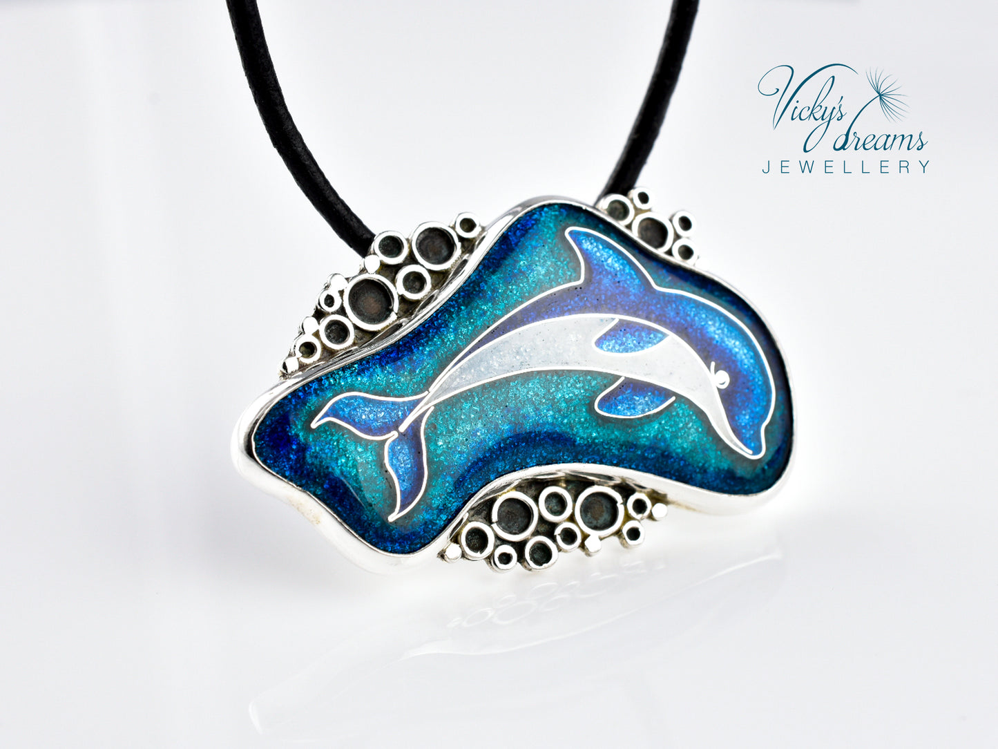 Handcrafted cloisonné dolphin pendant on sterling silver
