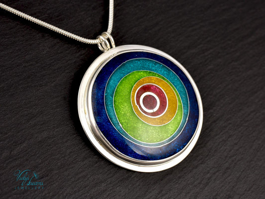 Handmade cloisonné enamel circles necklace in vibrant colors with sterling silver bezel