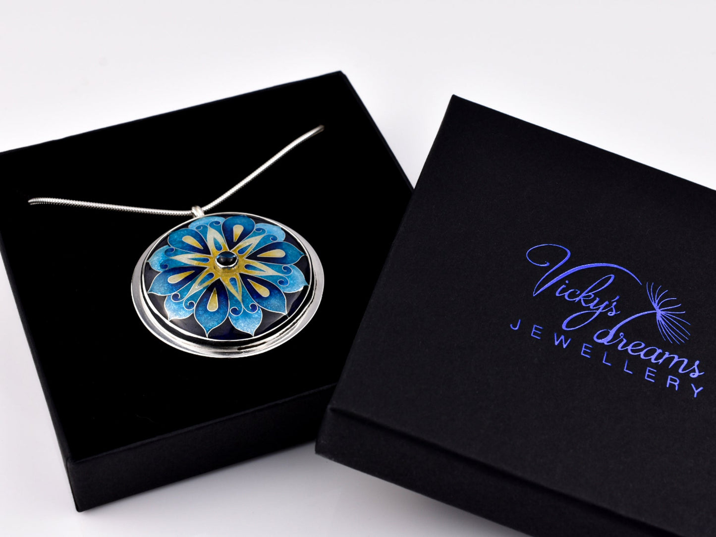 Handmade cloisonné blue mandala enamel pendant with London Blue Topaz gemstone in sterling silver