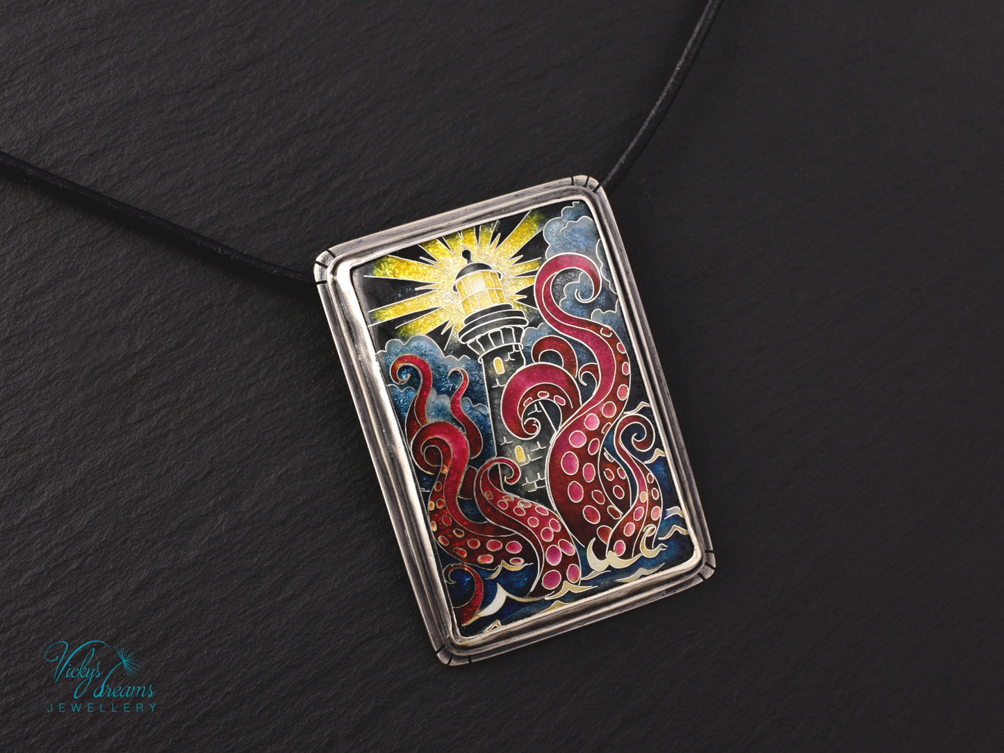 Lighthouse cloisonné enamel pendant with playful octopus on sterling silver