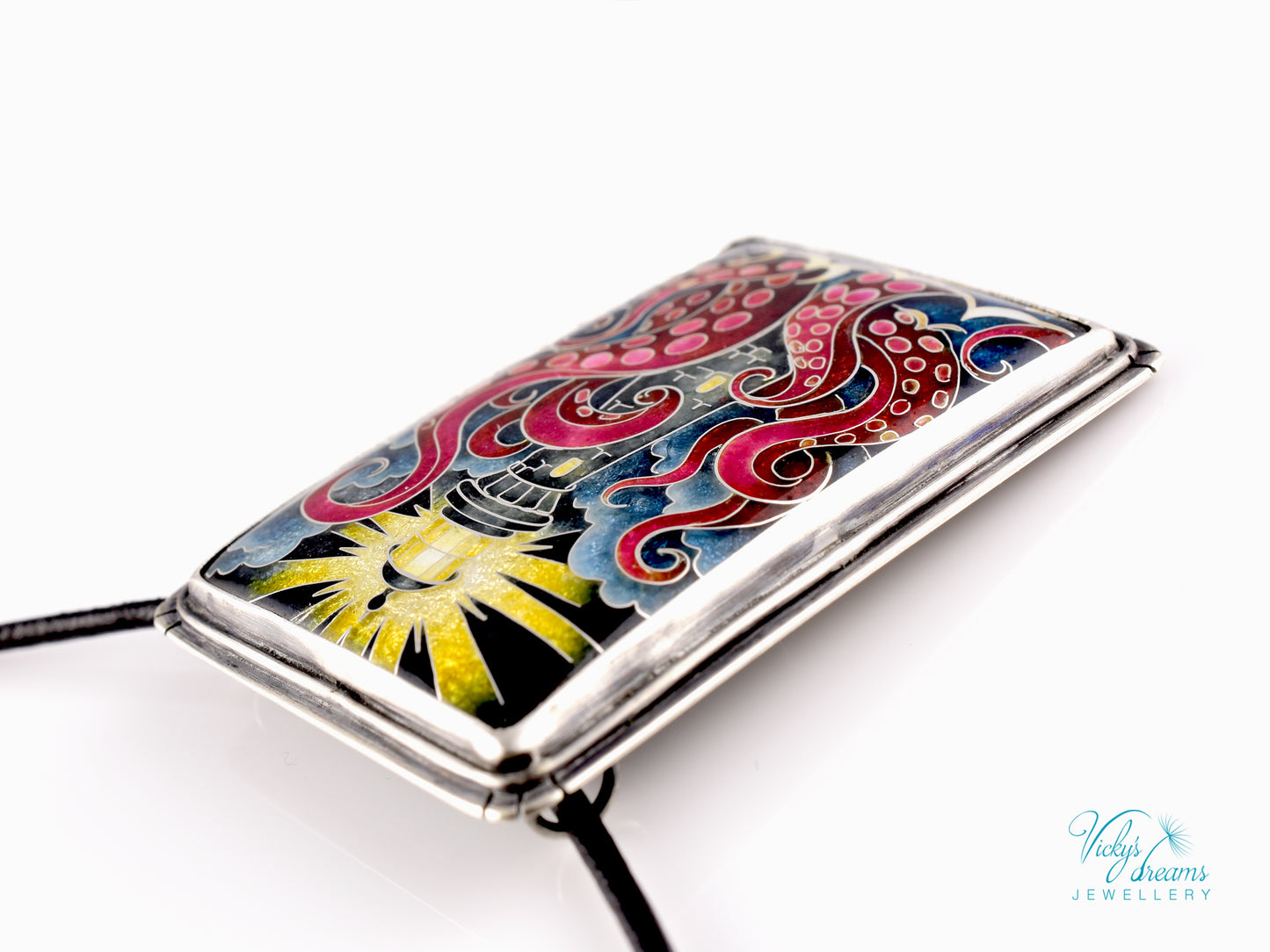 Lighthouse cloisonné enamel pendant with playful octopus on sterling silver