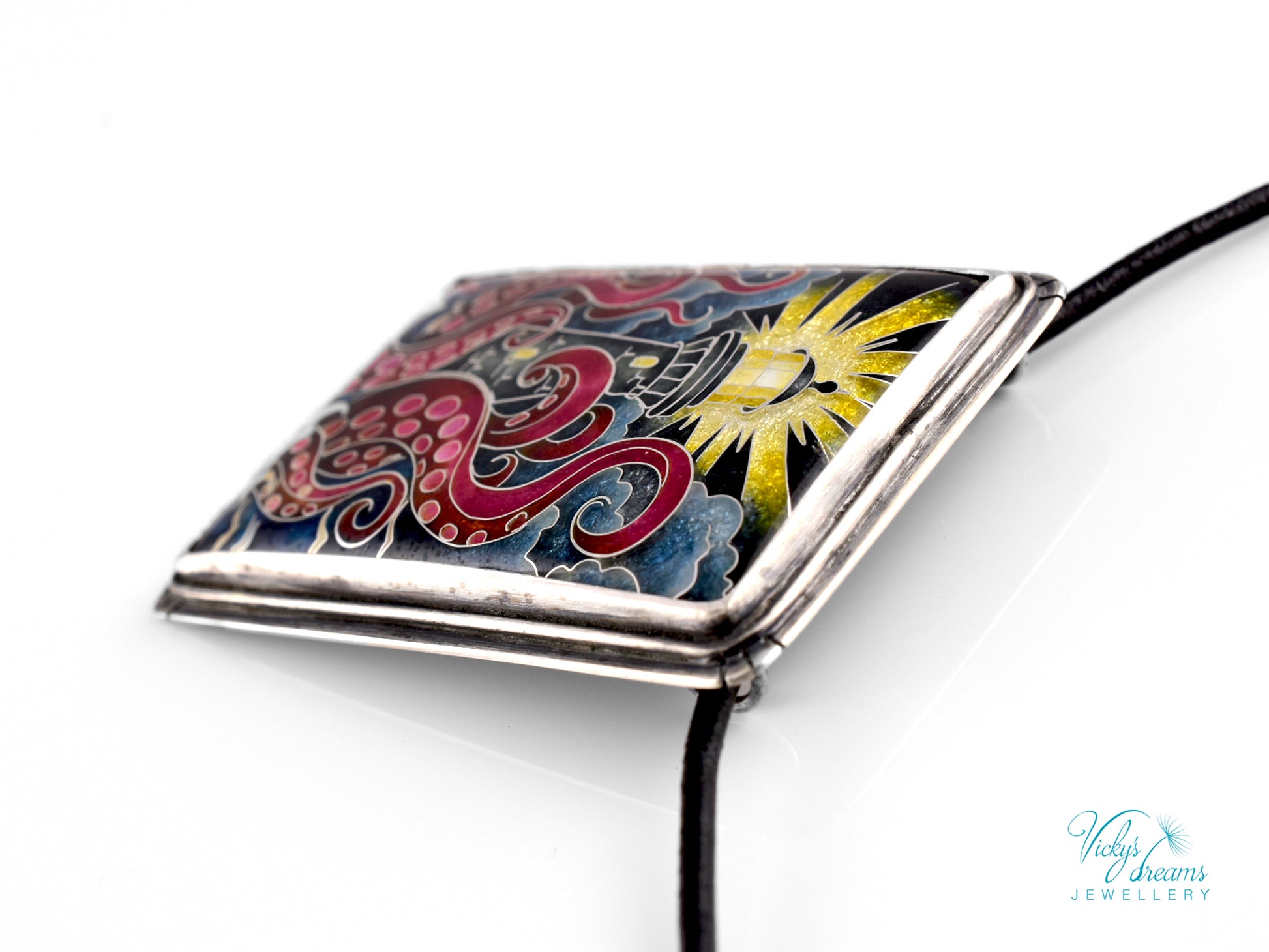 Lighthouse cloisonné enamel pendant with playful octopus on sterling silver
