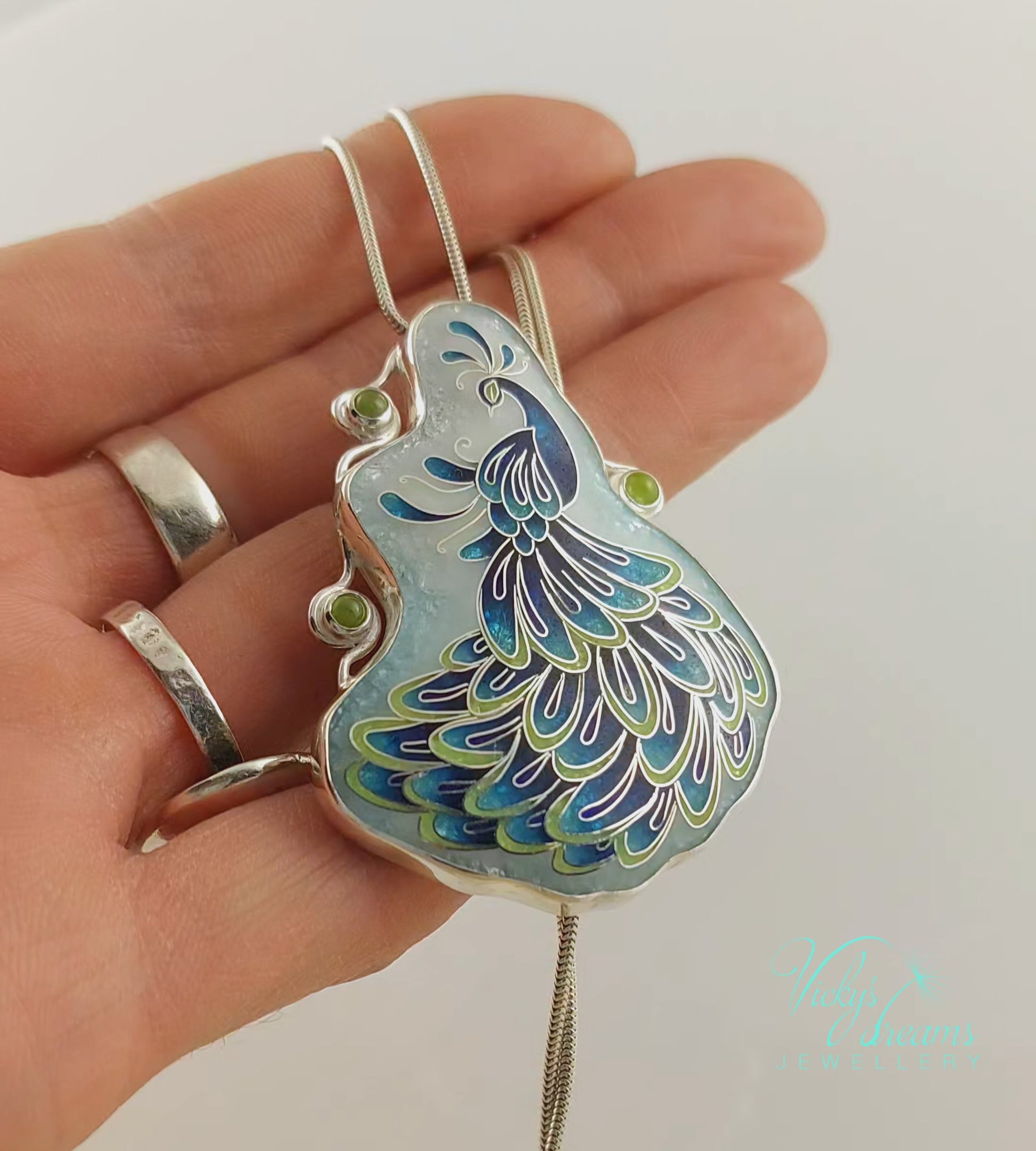 Handmade cloisonné enamel peacock necklace with peridot gemstones in sterling silver