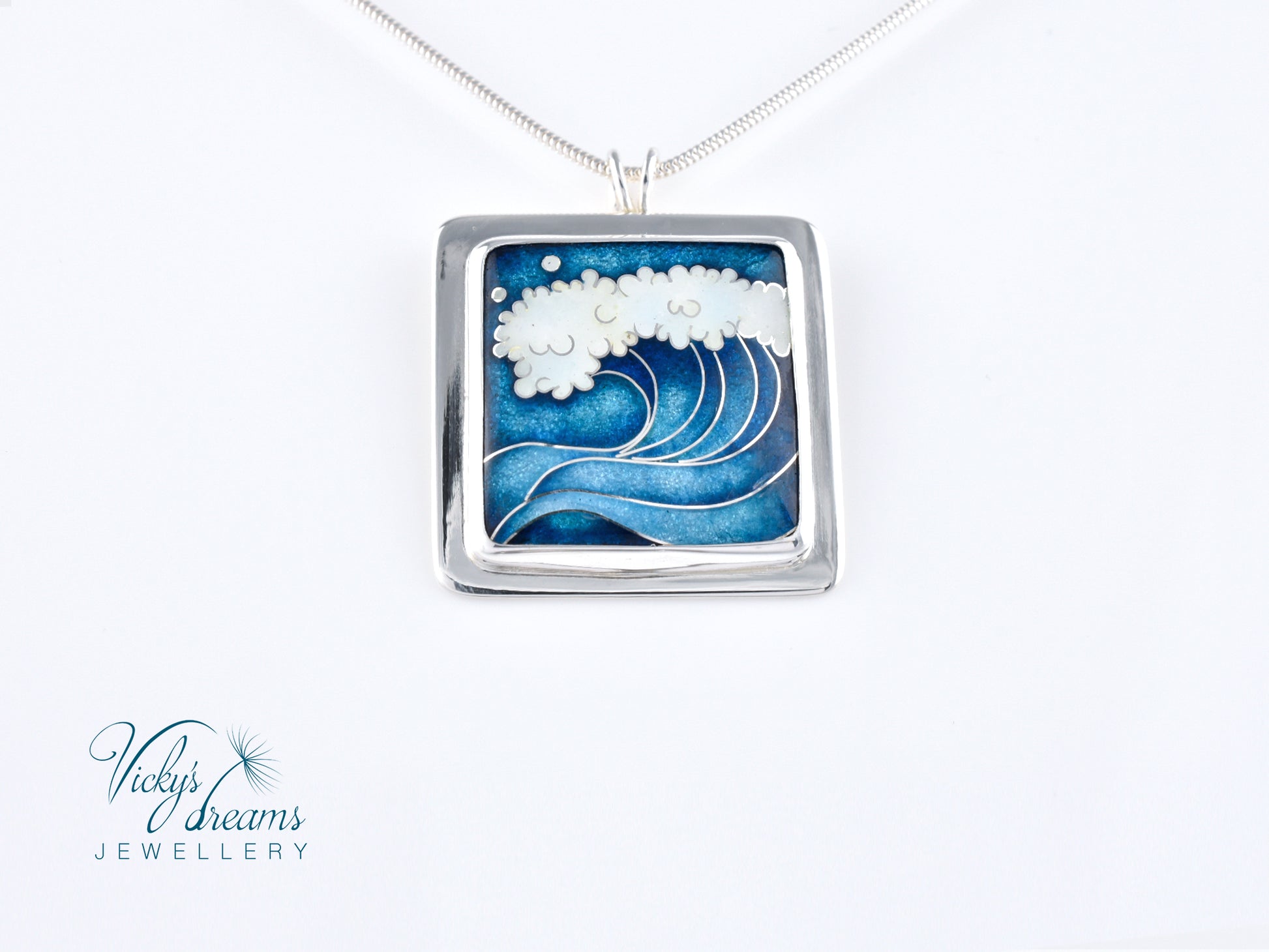 Cloisonné enamel necklace with blue and white sea wave design