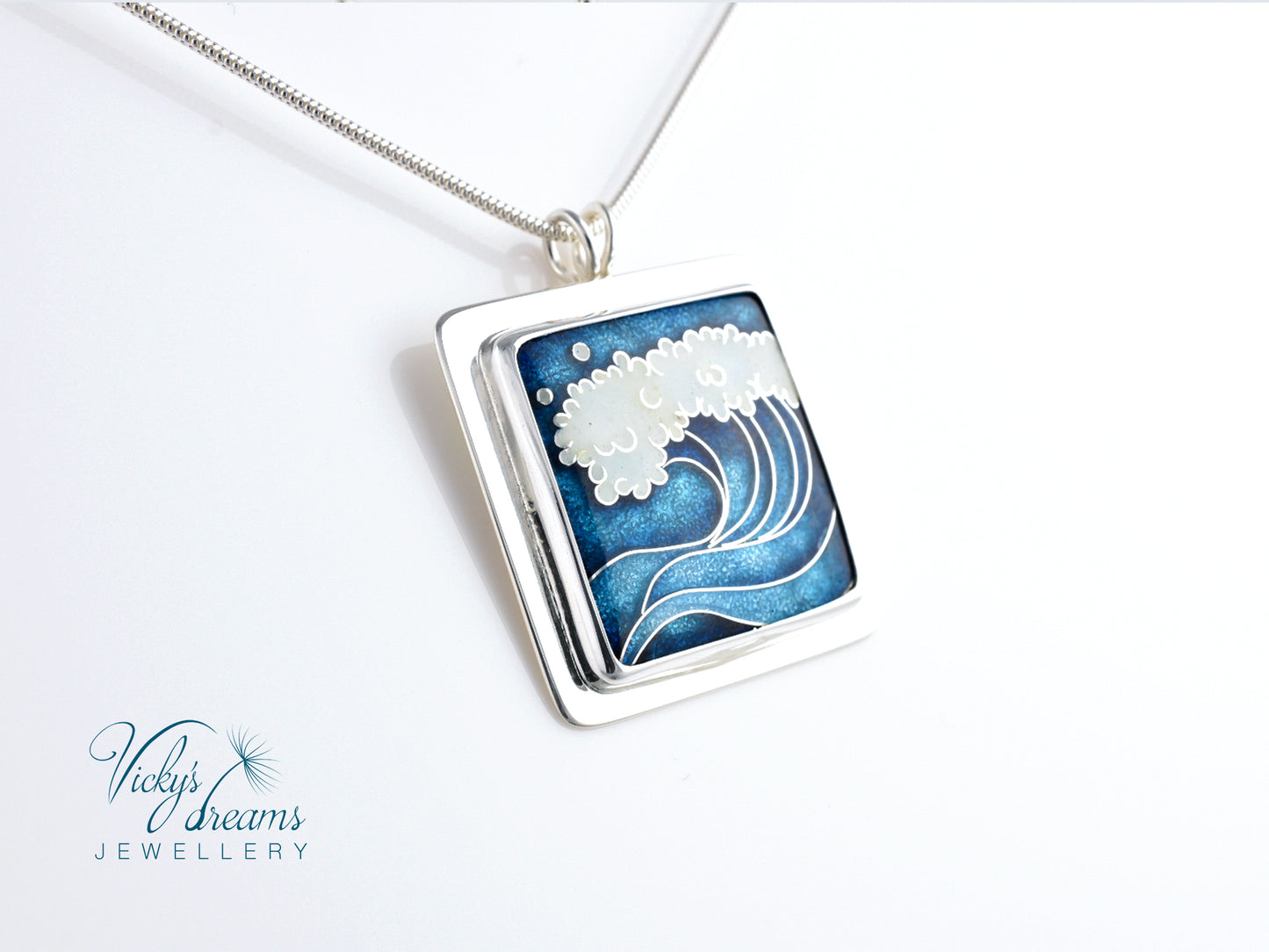 Cloisonné enamel necklace with blue and white sea wave design