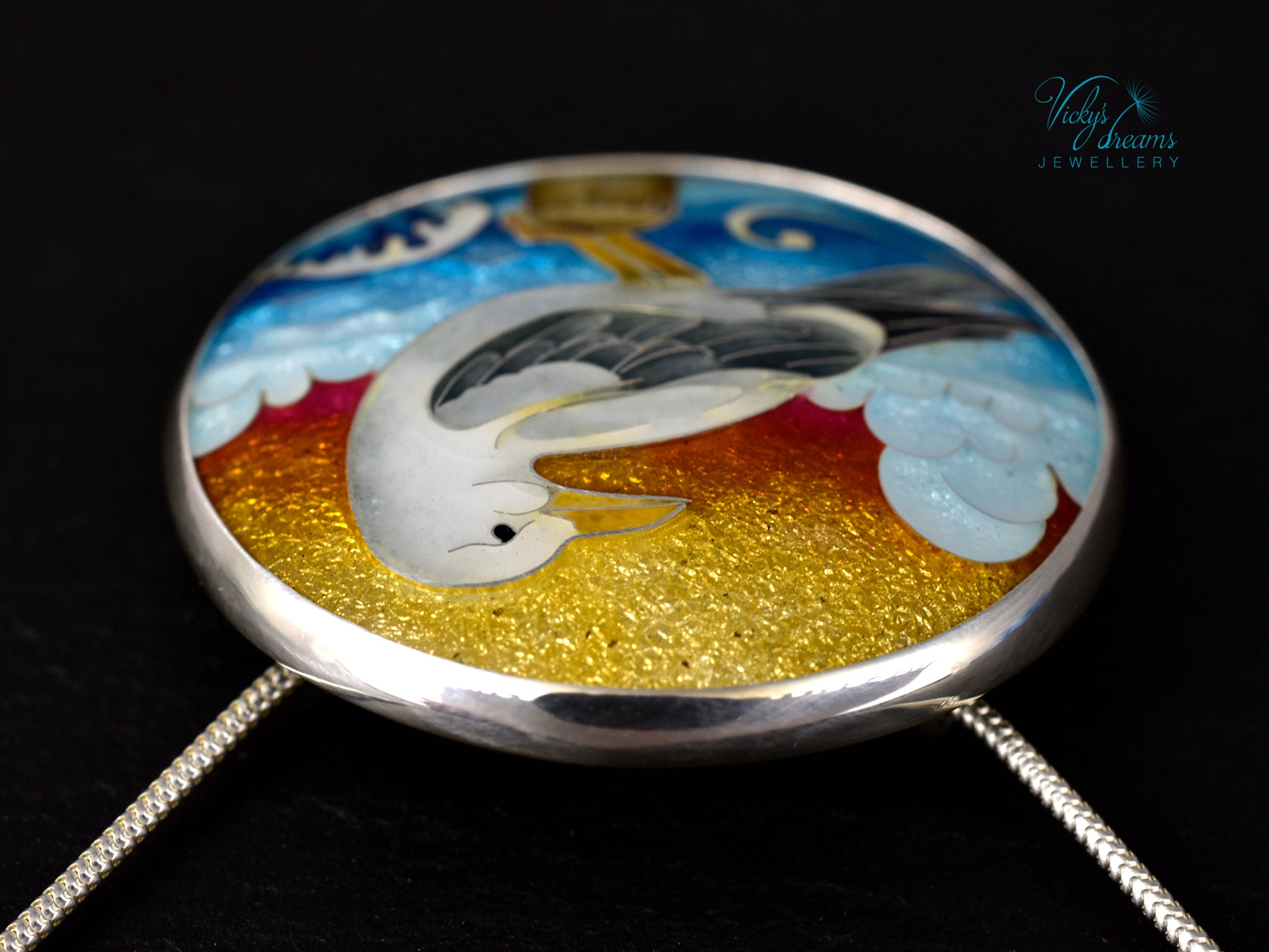 Handmade cloisonné seagull pendant necklace with sunset background