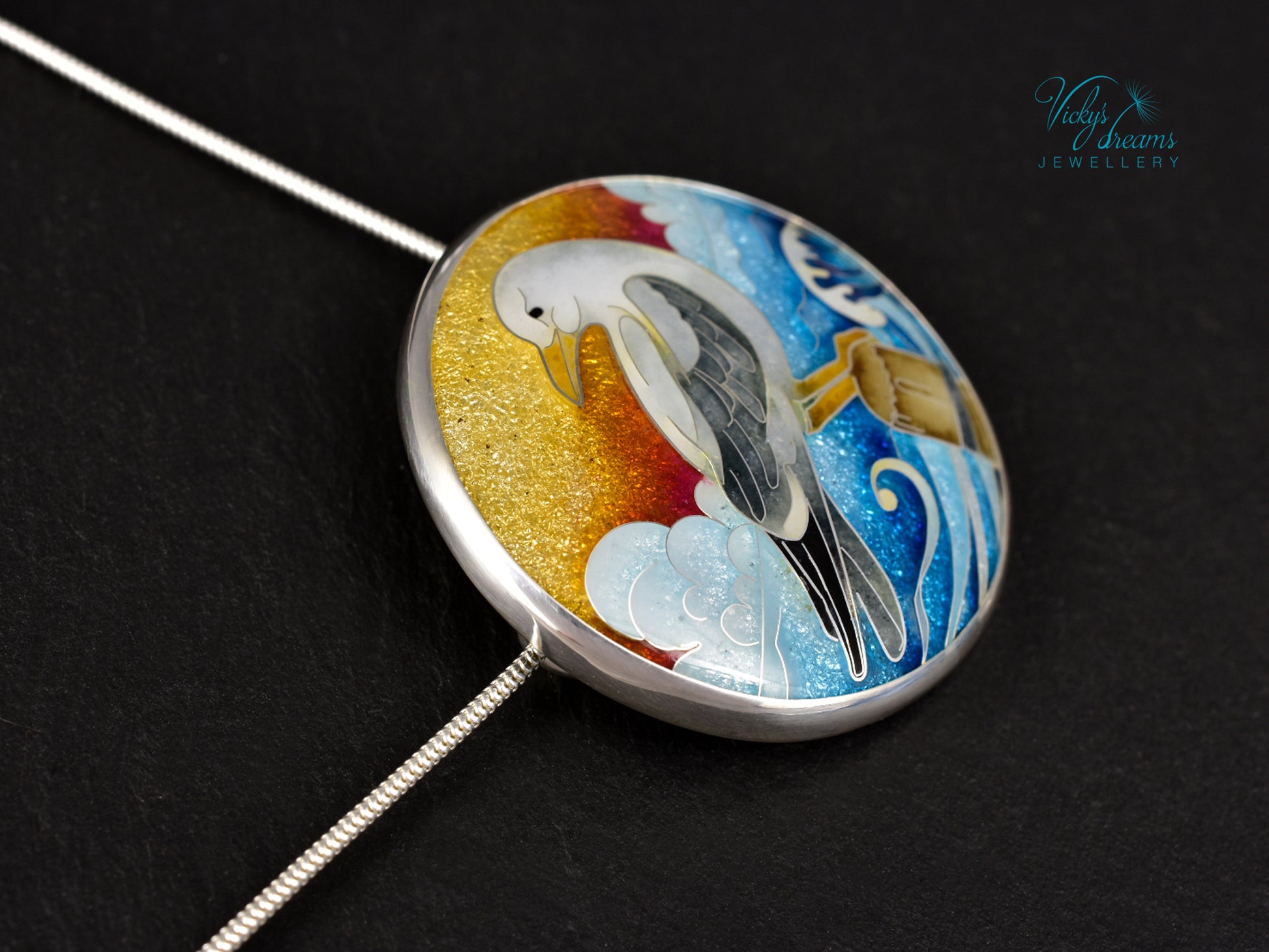 Handmade cloisonné seagull pendant necklace with sunset background