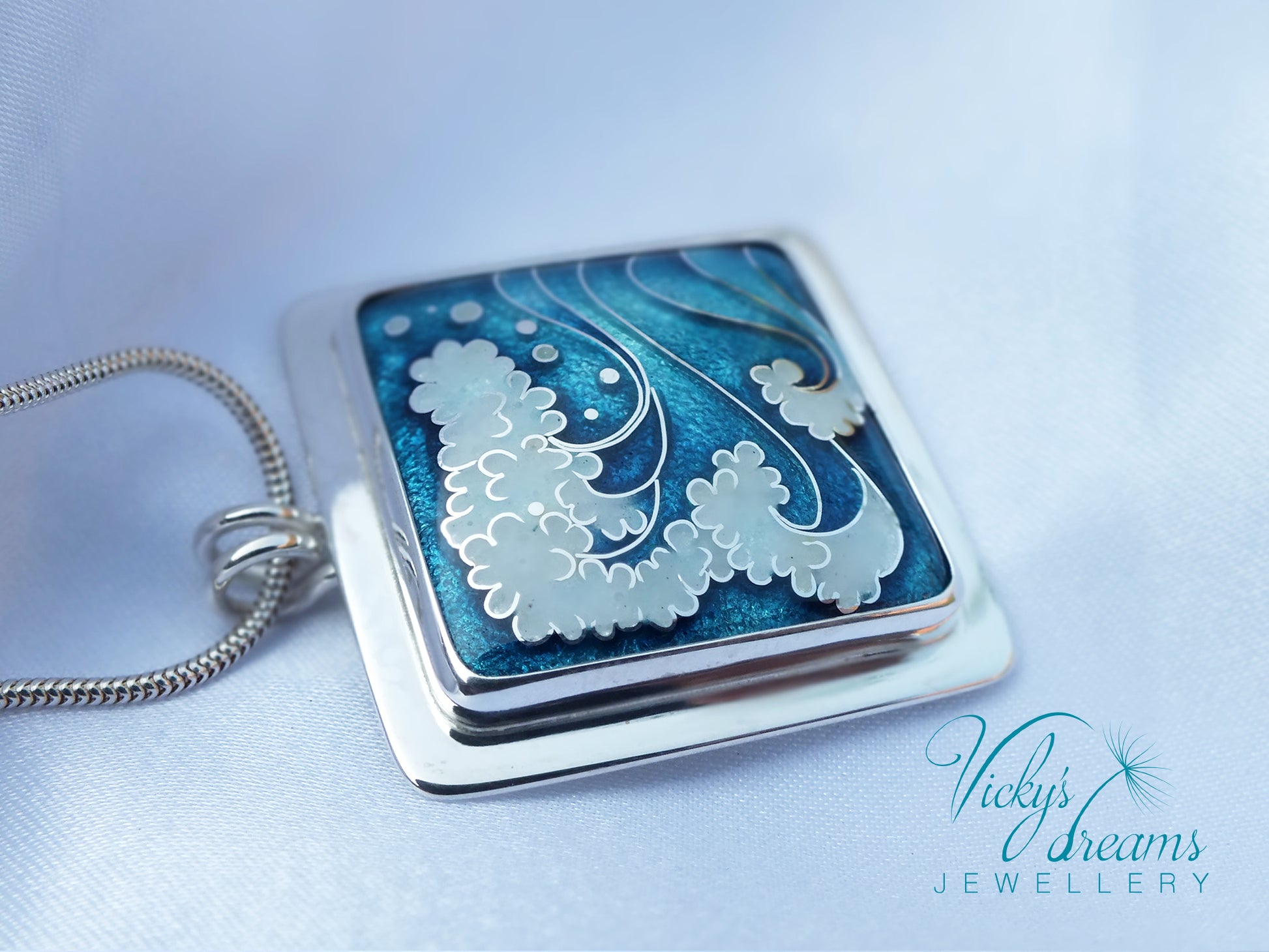 Cloisonné enamel necklace with blue and white sea wave