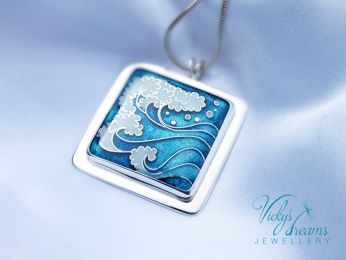 Cloisonné enamel necklace with blue and white sea wave