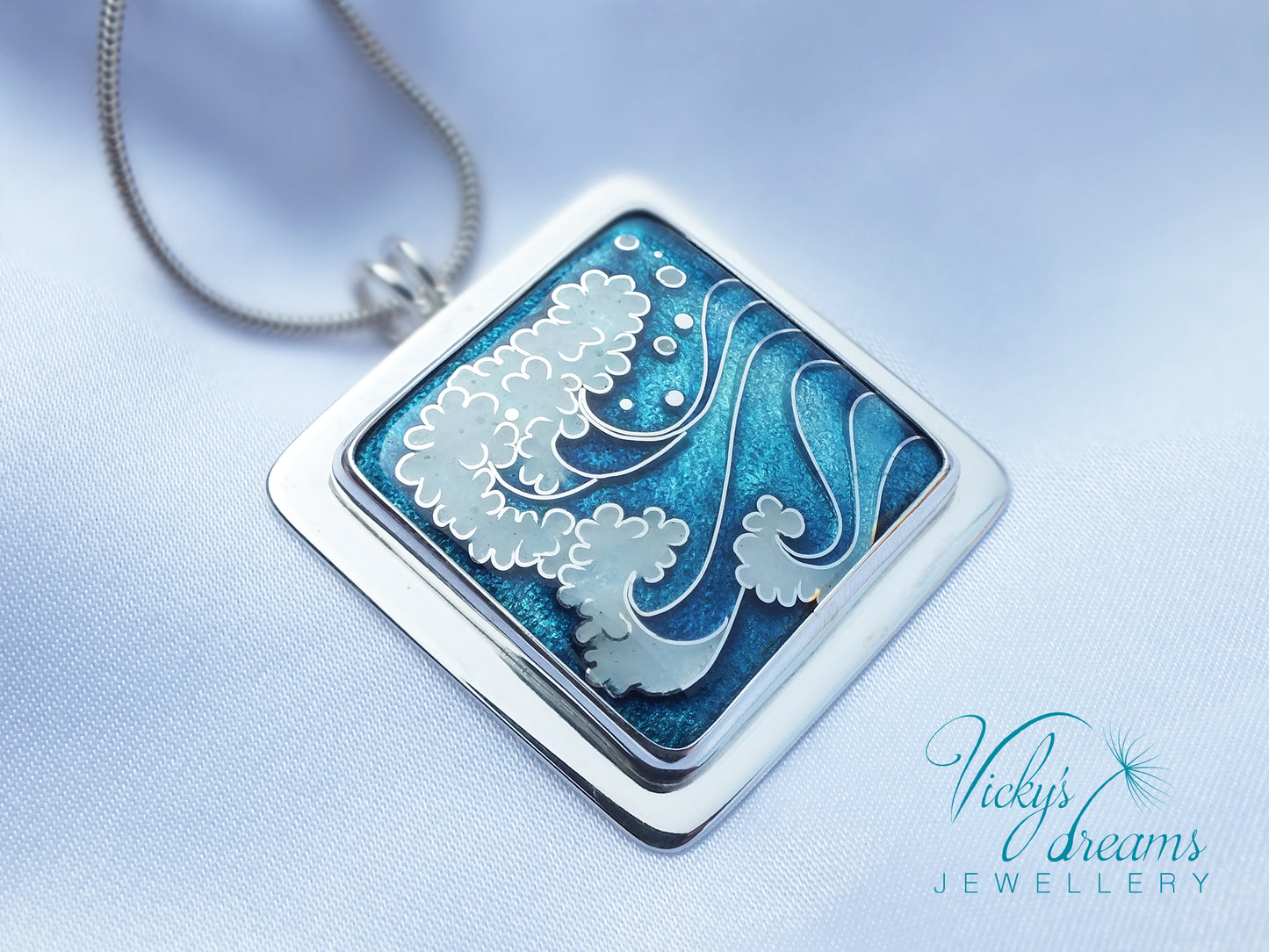 Cloisonné enamel necklace with blue and white sea wave