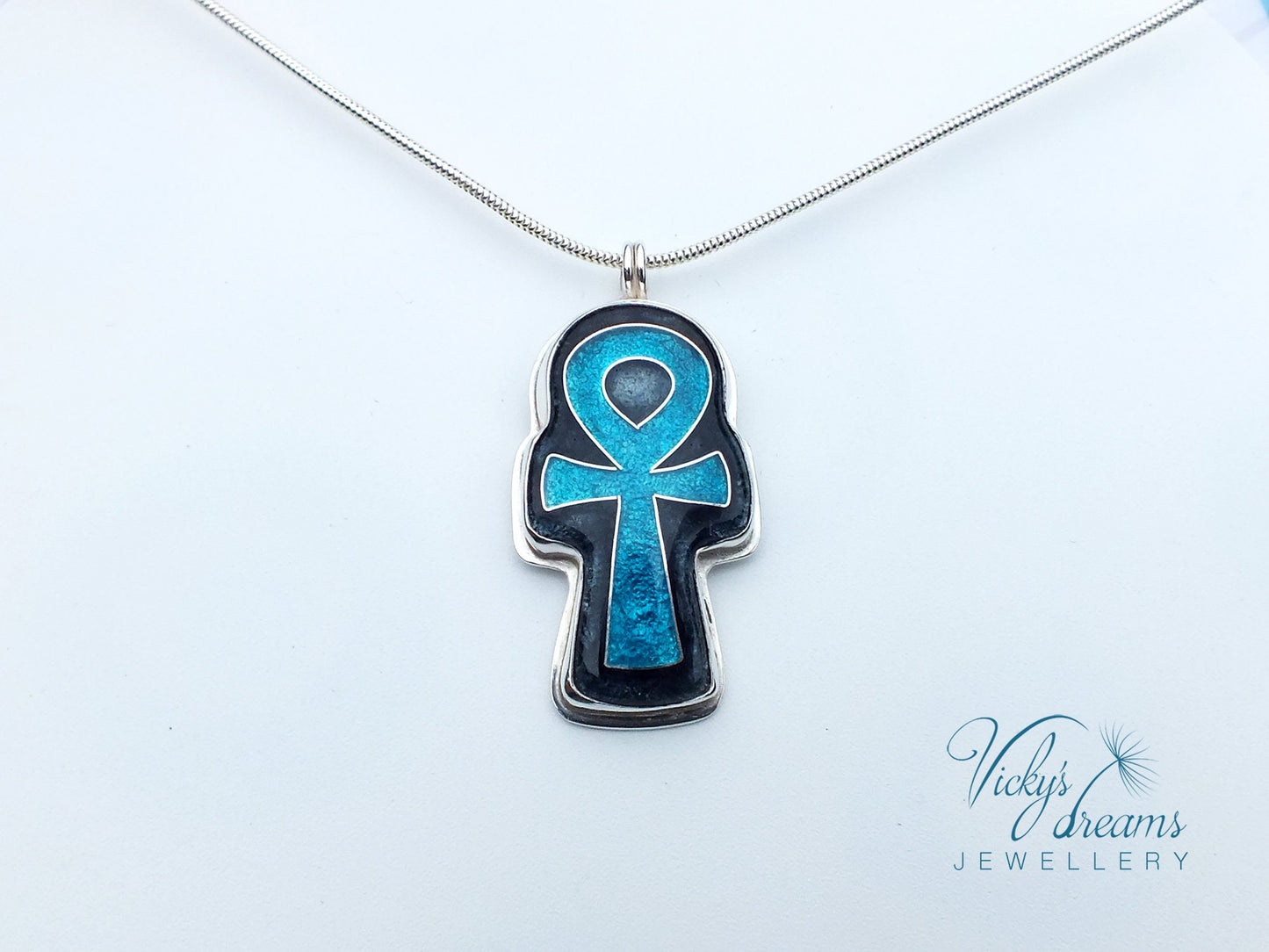 Handmade sterling silver Ankh pendant with colorful cloisonné enamel details.