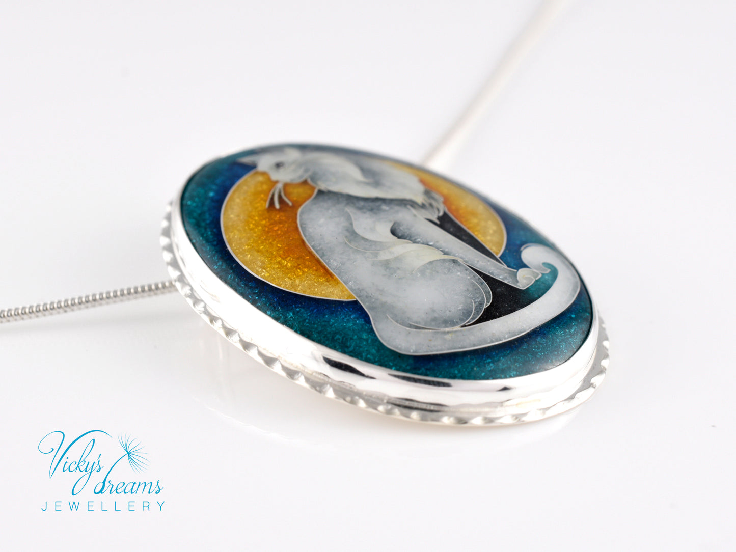 Handcrafted cloisonné cat pendant necklace with vibrant turquoise and yellow enamel