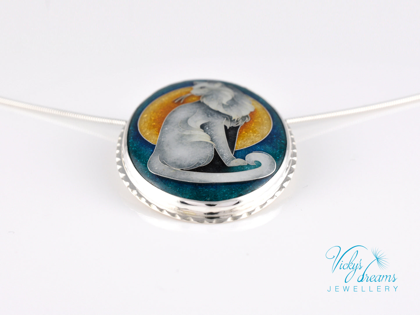 Handcrafted cloisonné cat pendant necklace with vibrant turquoise and yellow enamel