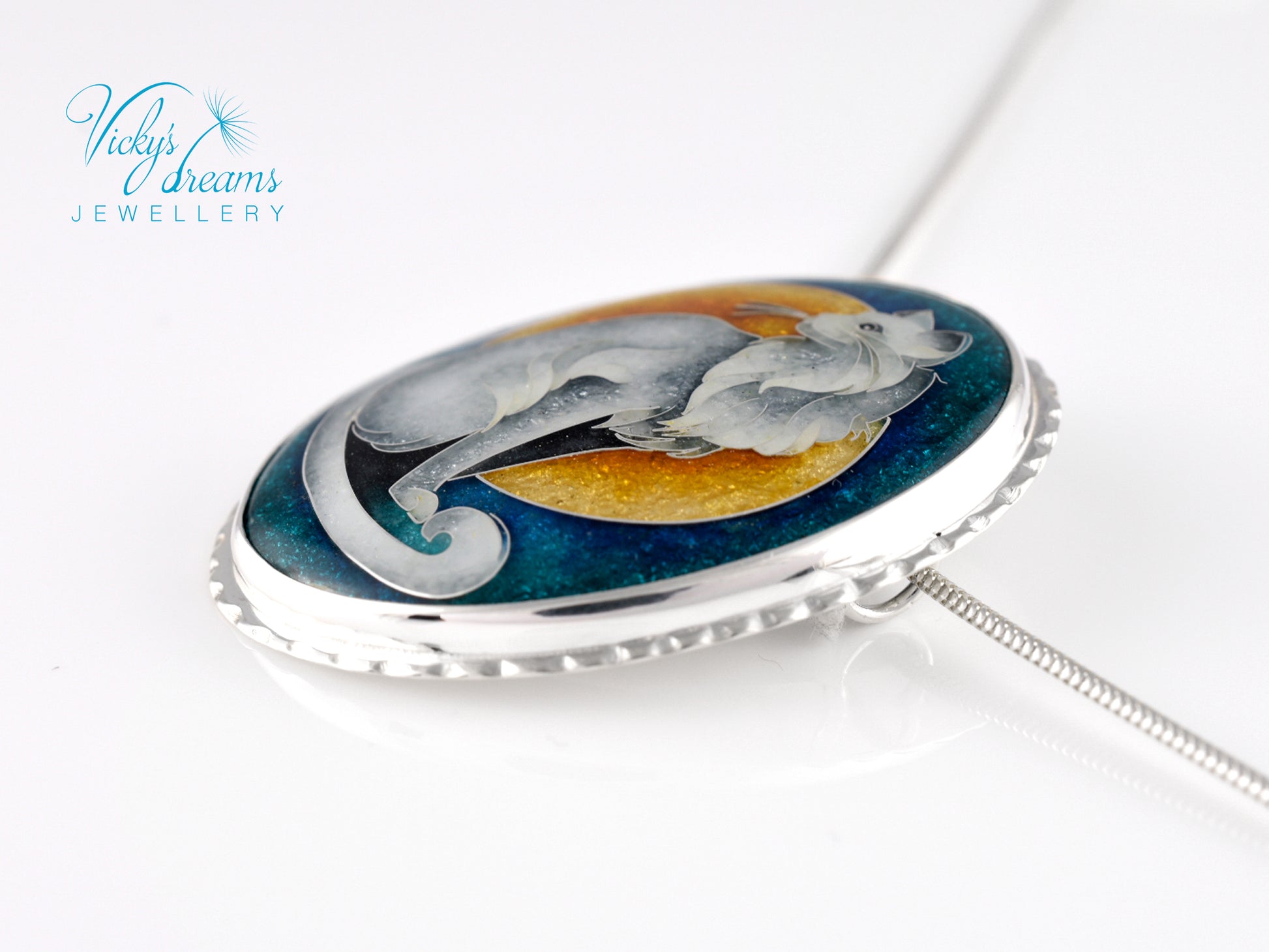 Handcrafted cloisonné cat pendant necklace with vibrant turquoise and yellow enamel