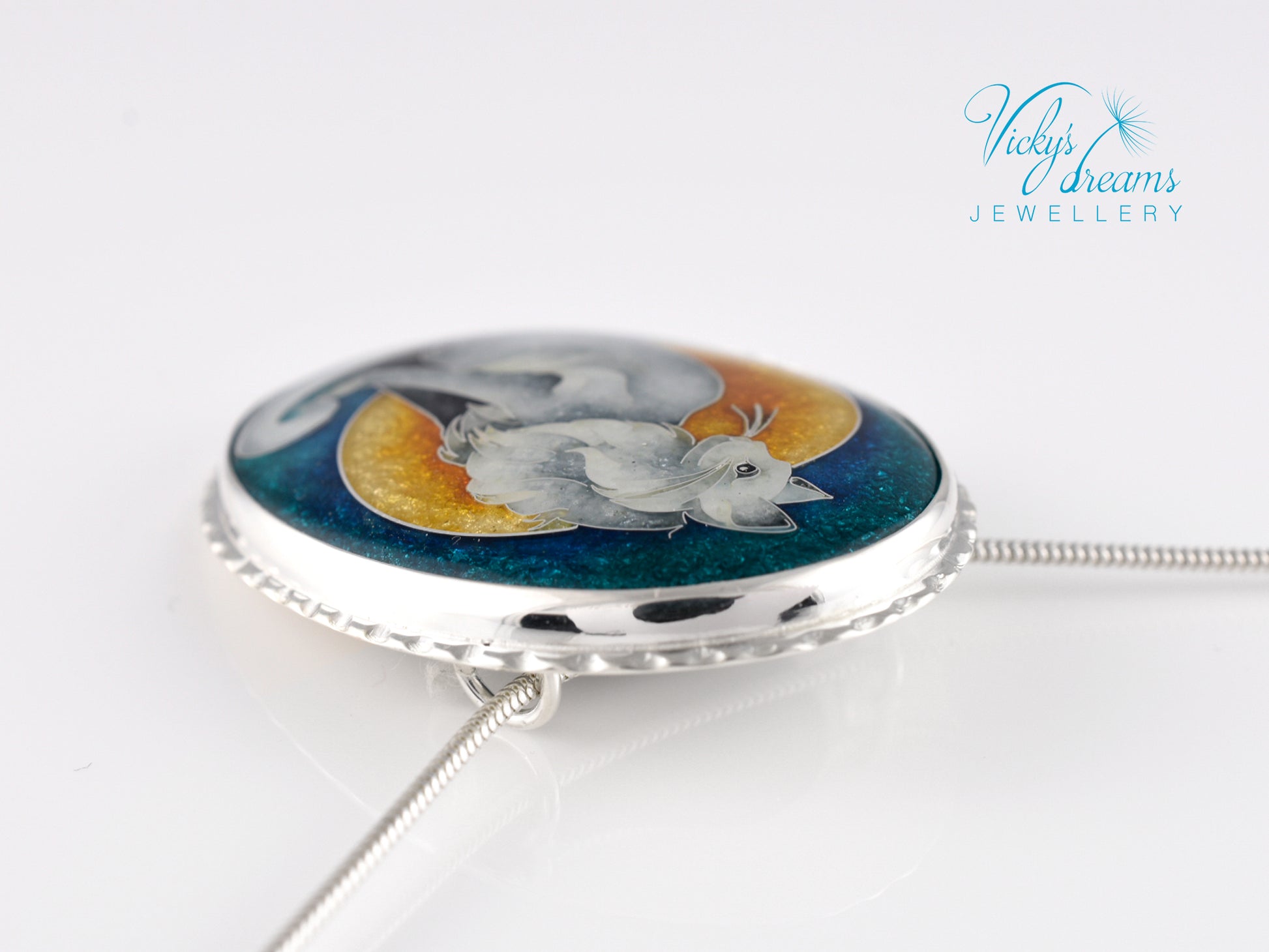 Handcrafted cloisonné cat pendant necklace with vibrant turquoise and yellow enamel