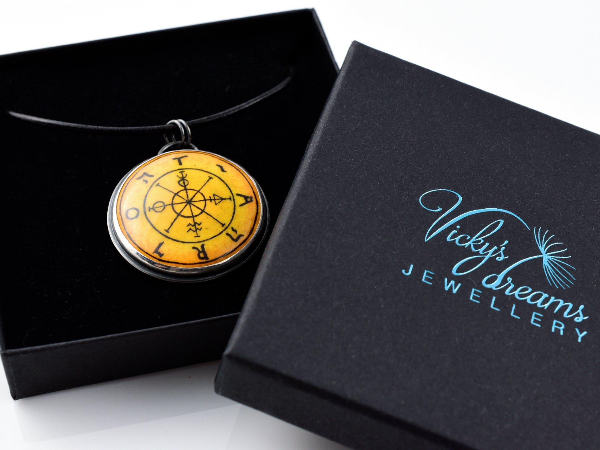 Hand painted enamel Wheel of Fortune tarot pendant in sterling silver and copper with leather cord