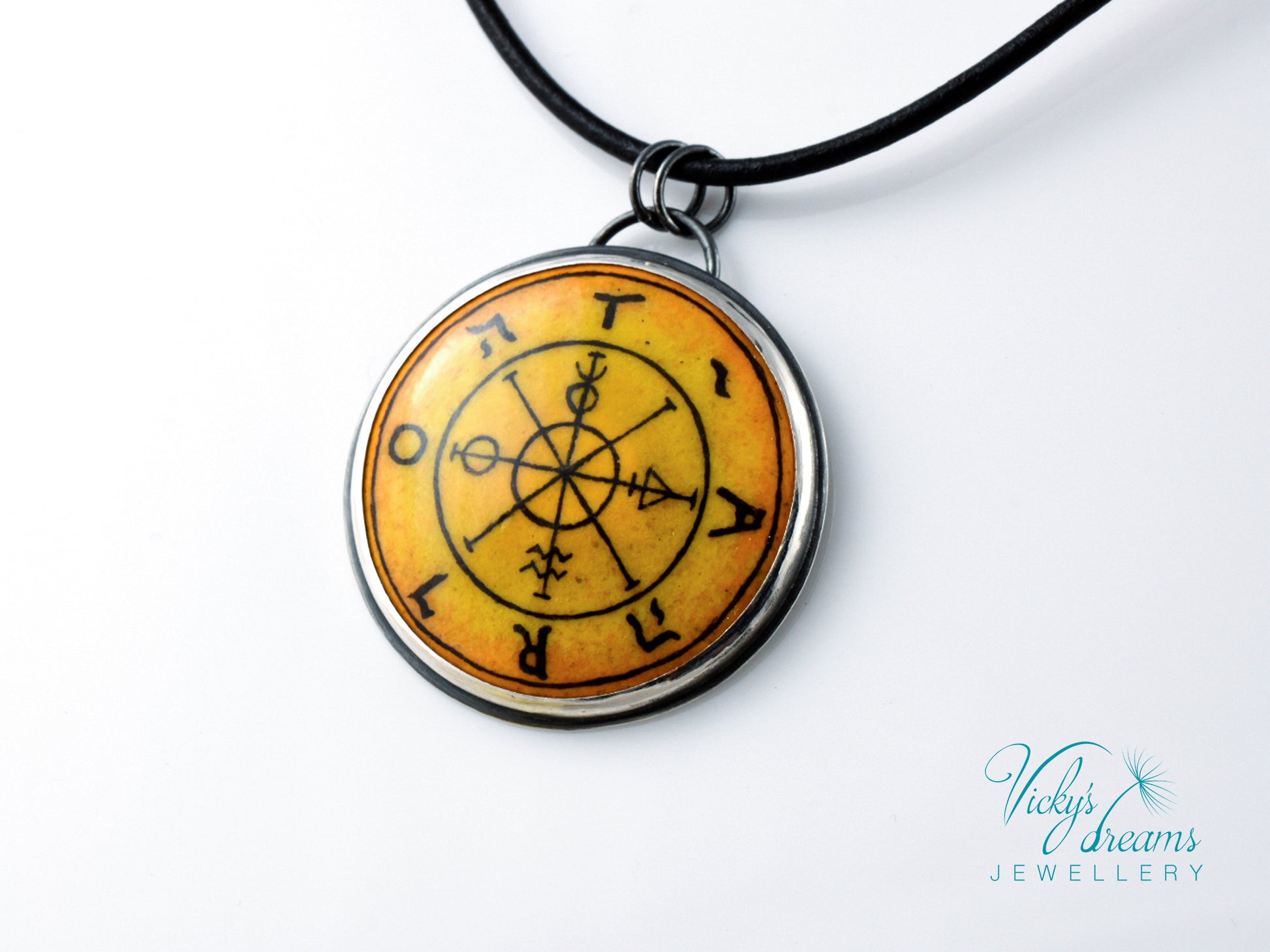 Hand painted enamel Wheel of Fortune tarot pendant in sterling silver and copper with leather cord