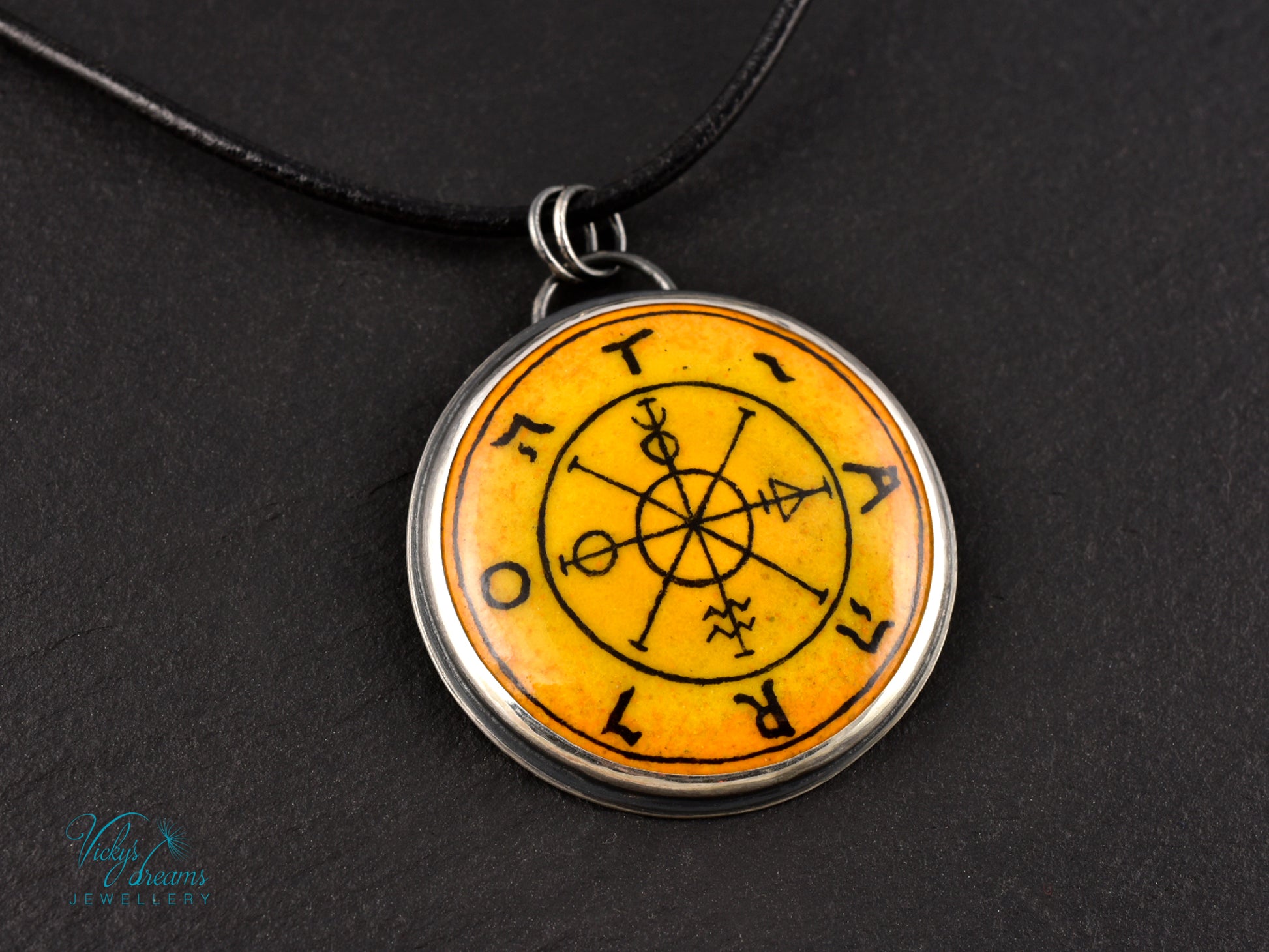 Hand painted enamel Wheel of Fortune tarot pendant in sterling silver and copper with leather cord