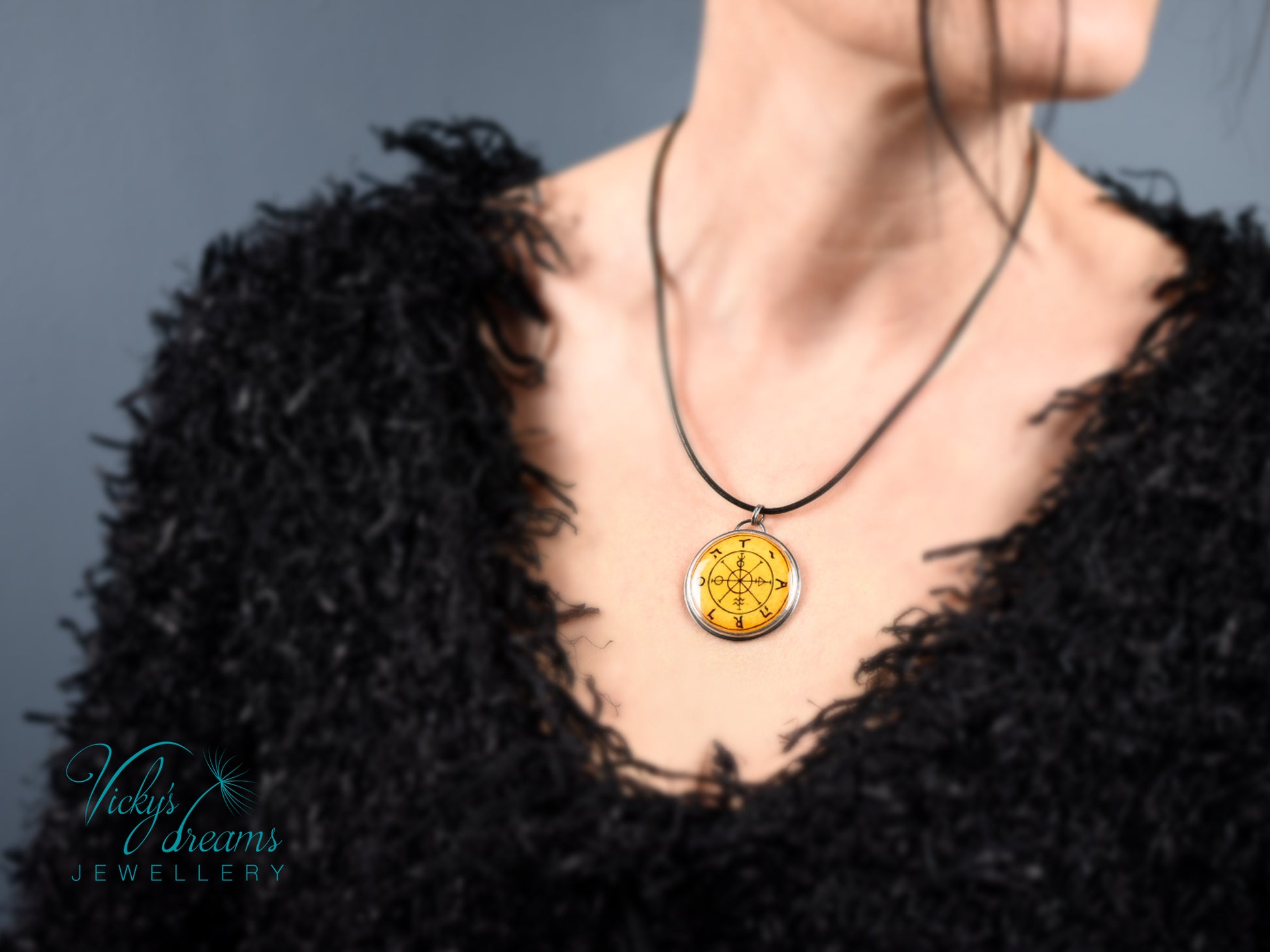 Hand painted enamel Wheel of Fortune tarot pendant in sterling silver and copper with leather cord