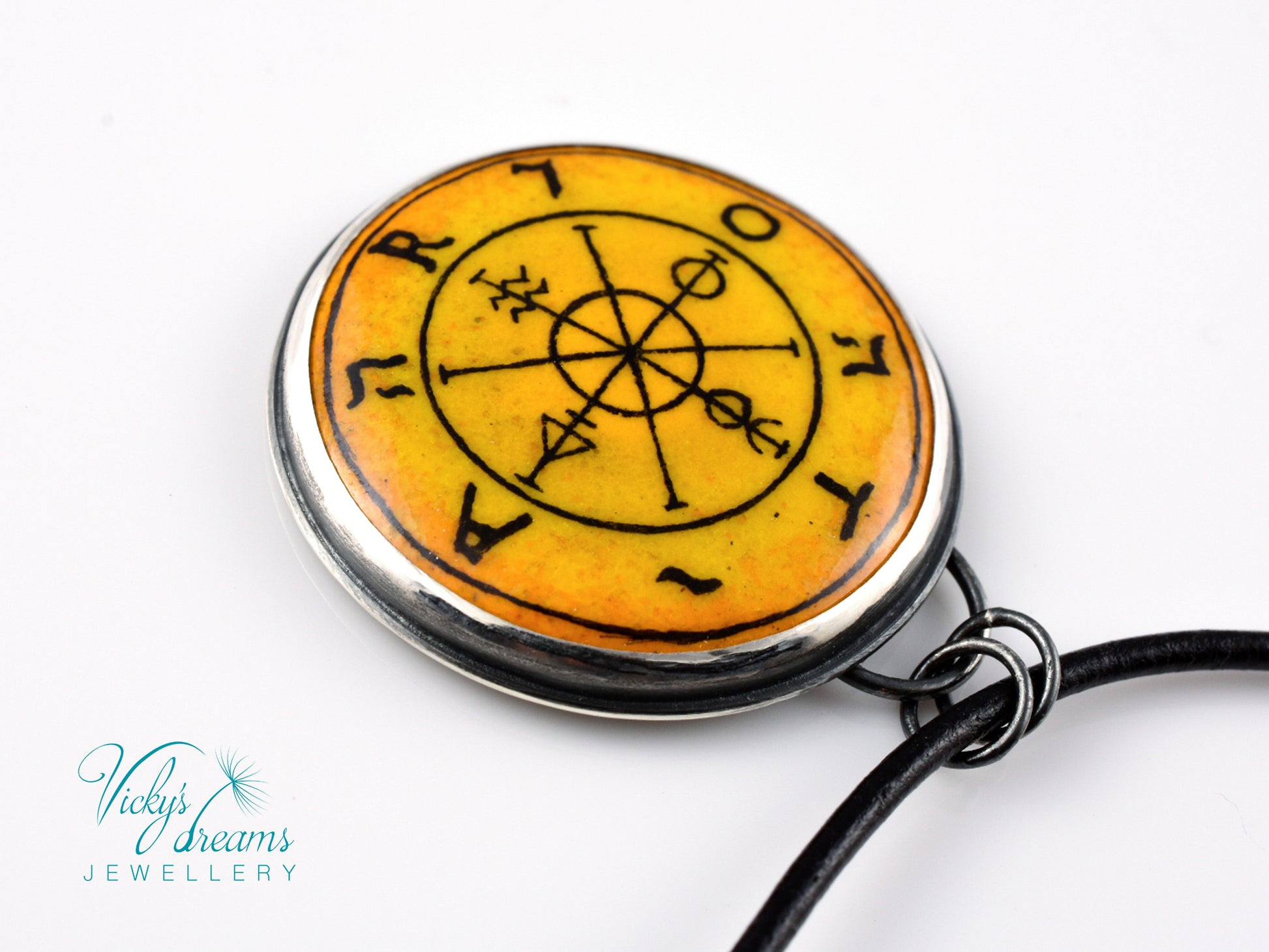 Hand painted enamel Wheel of Fortune tarot pendant in sterling silver and copper with leather cord