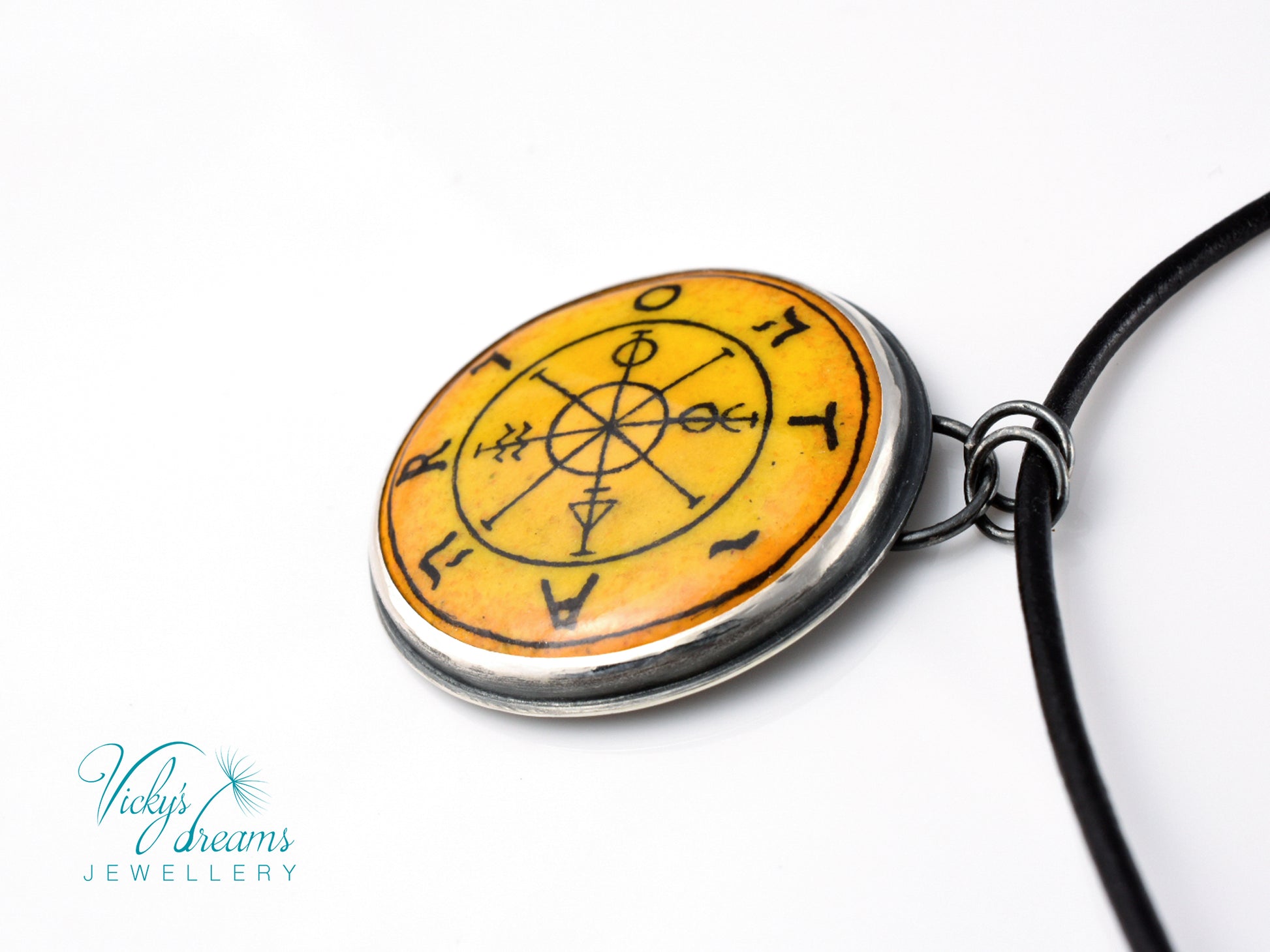 Hand painted enamel Wheel of Fortune tarot pendant in sterling silver and copper with leather cord