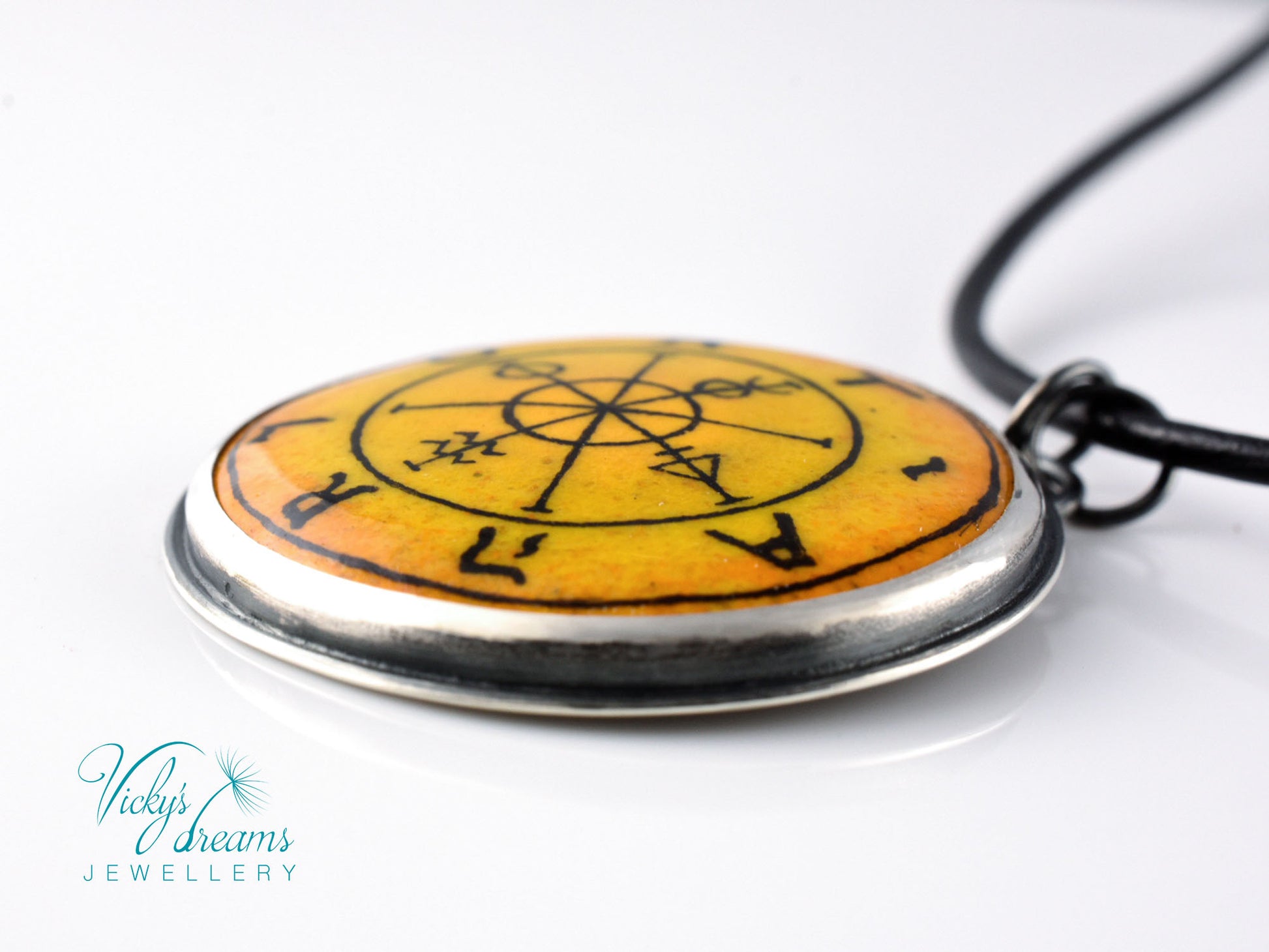 Hand painted enamel Wheel of Fortune tarot pendant in sterling silver and copper with leather cord
