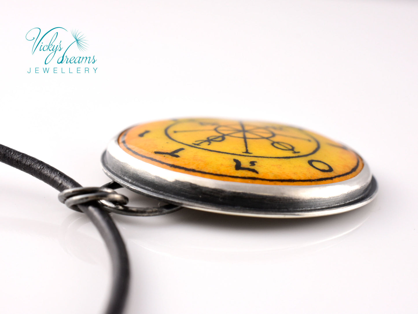 Hand painted enamel Wheel of Fortune tarot pendant in sterling silver and copper with leather cord
