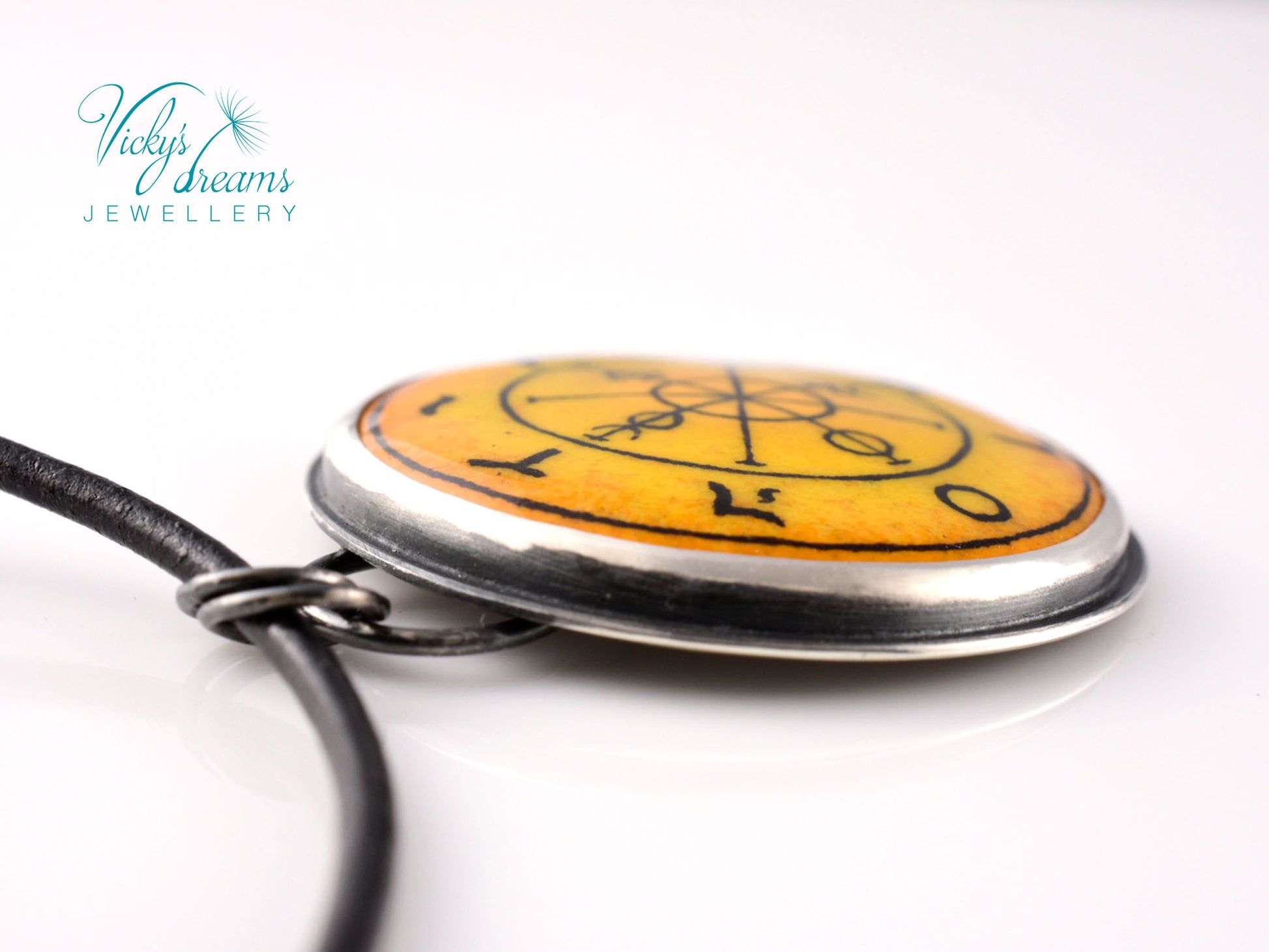 Hand painted enamel Wheel of Fortune tarot pendant in sterling silver and copper with leather cord