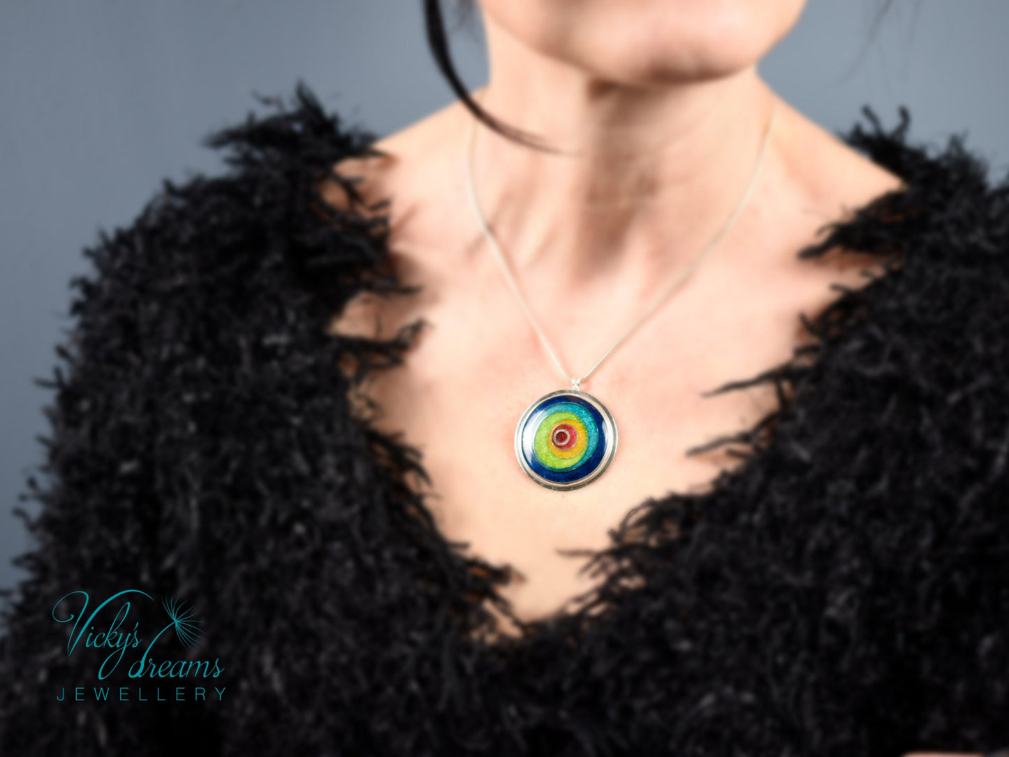 Handmade cloisonné enamel circles pendant in vibrant colors with sterling silver bezel