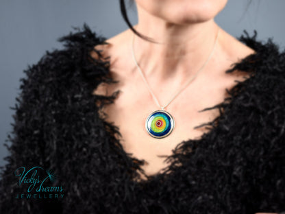 Handmade cloisonné enamel circles pendant in vibrant colors with sterling silver bezel