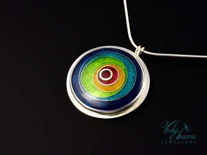 Handmade cloisonné enamel circles pendant in vibrant colors with sterling silver bezel