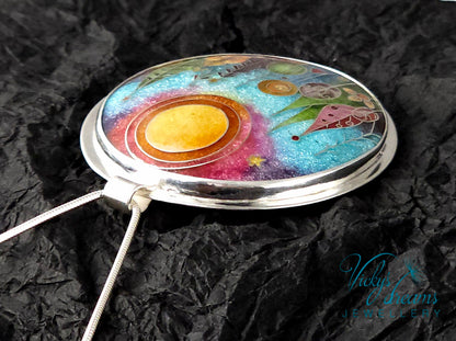 Handmade sterling silver cloisonné enamel pendant featuring a dreamlike forest with stylized trees, flowing lines, spiral motifs, and subtle stars