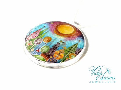 Handmade sterling silver cloisonné enamel pendant featuring a dreamlike forest with stylized trees, flowing lines, spiral motifs, and subtle stars