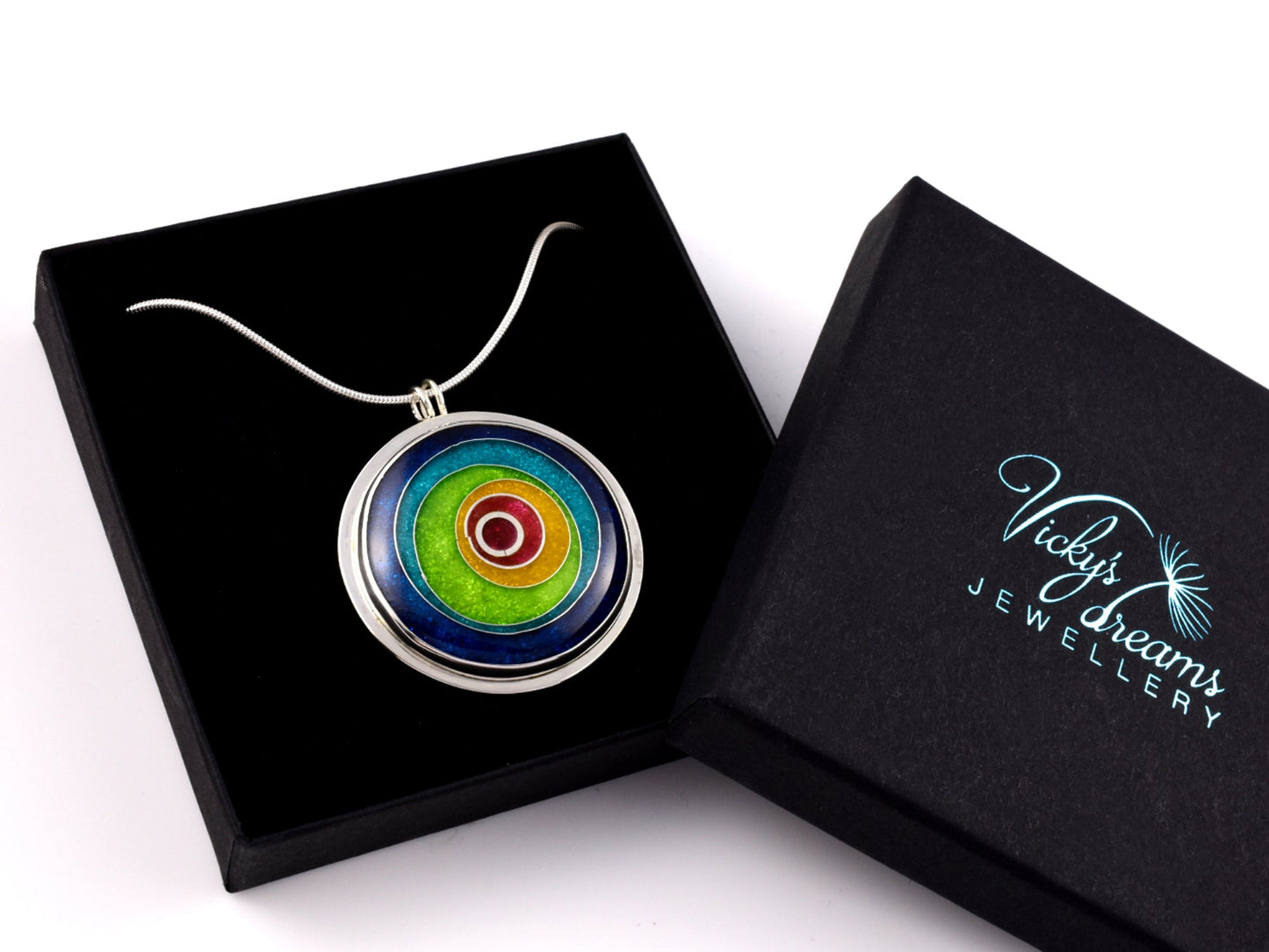 Handmade cloisonné enamel circles pendant in vibrant colors with sterling silver bezel
