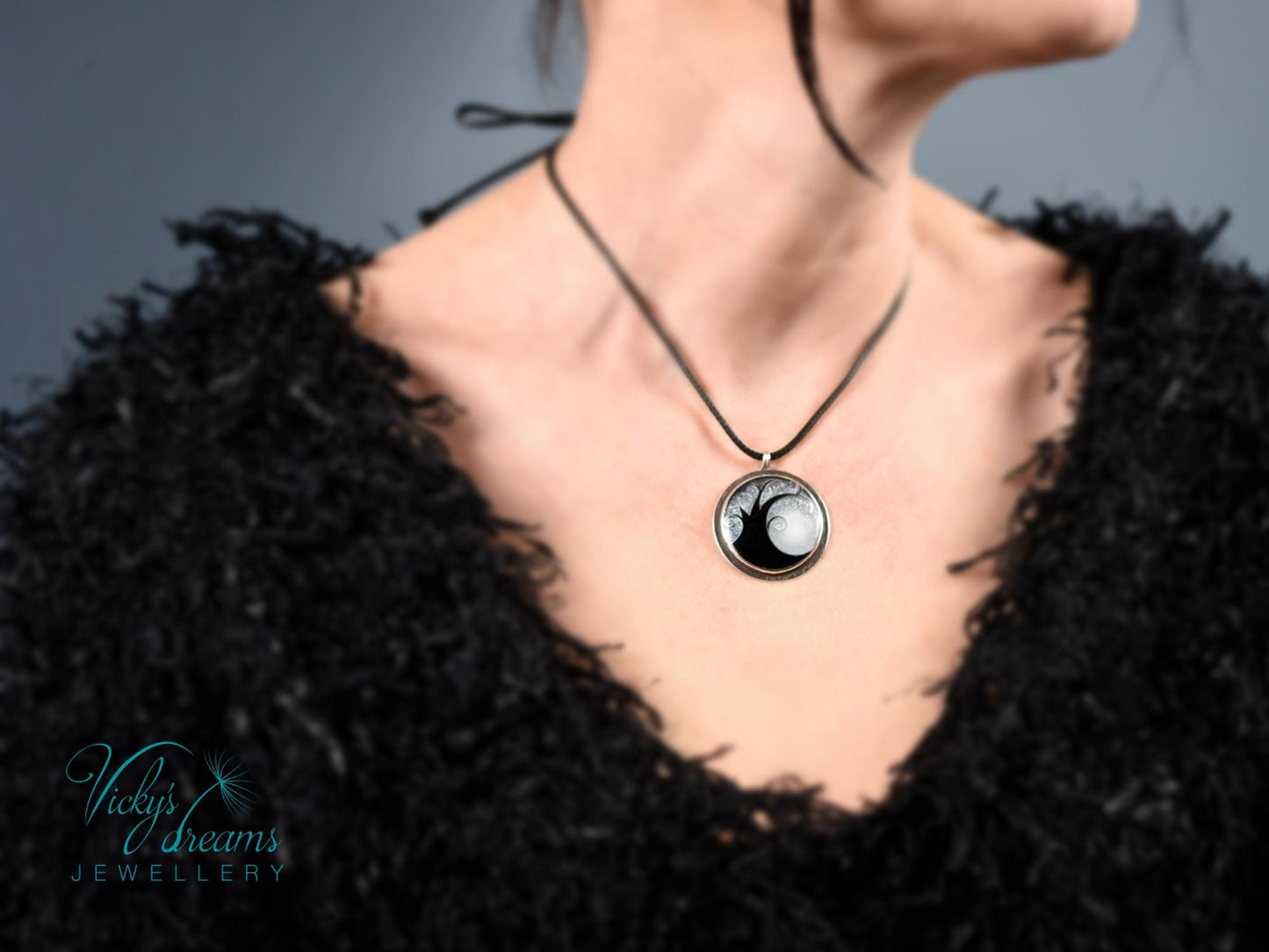 Elegant black cloisonné enamel tree pendant on sterling silver with leather cord