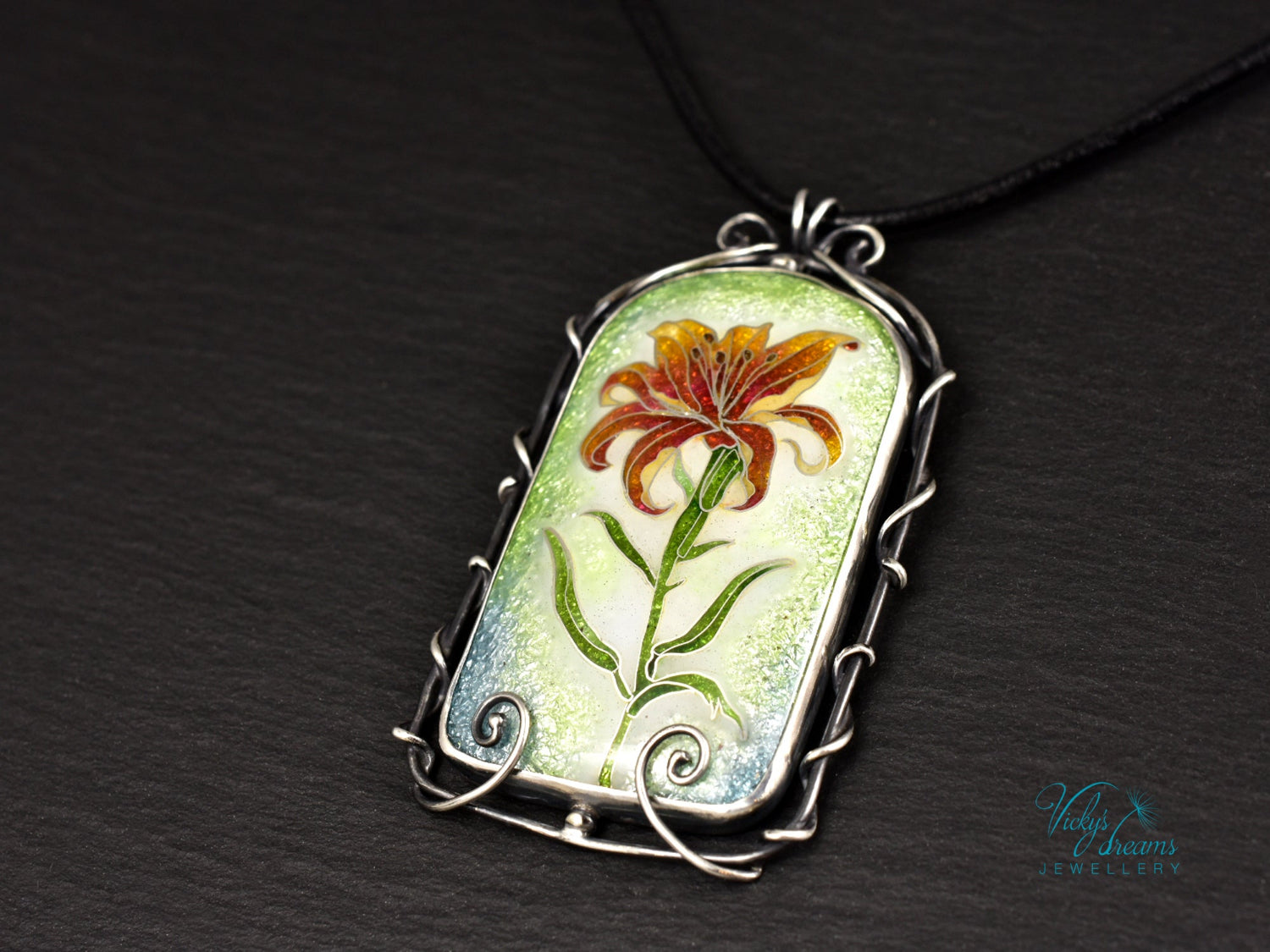 Handmade cloisonné fire lily enamel pendant on sterling silver with leather cord