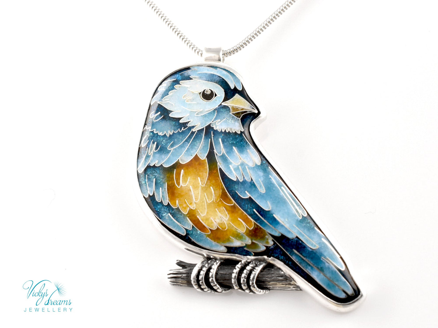 Bird-shaped pendant with blue and orange feathers 