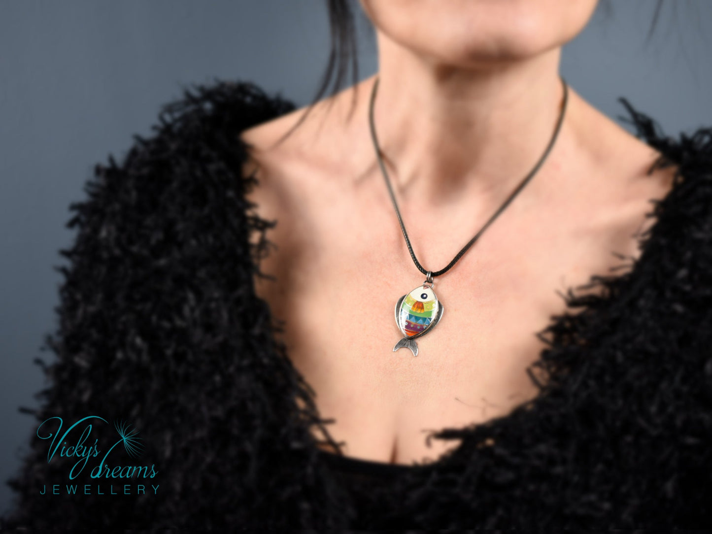 Handmade cloisonné enamel fish pendant in vibrant colors with sterling silver