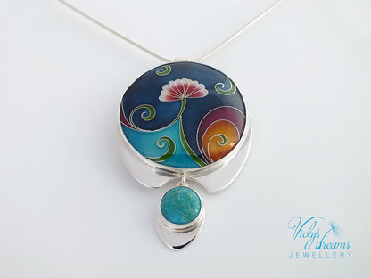 Colorful pendant with floral design on a white background, branded 'Vicky's Dreams Jewellery'.