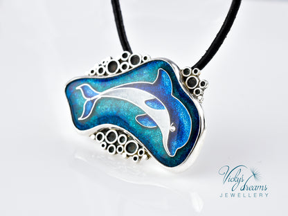 Dolphin pendant necklace on a white background with 'Vicky's Dreams Jewellery' branding.