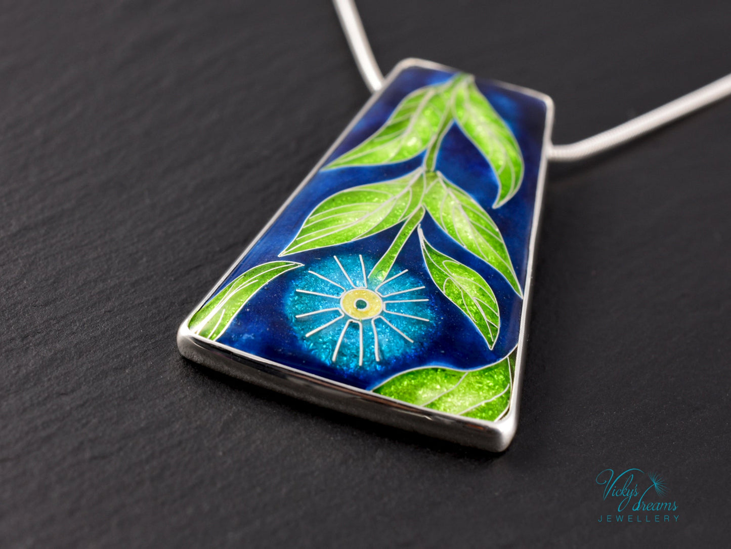 Handmade cloisonné enamel floral pendant on sterling silver necklace, vibrant botanical design