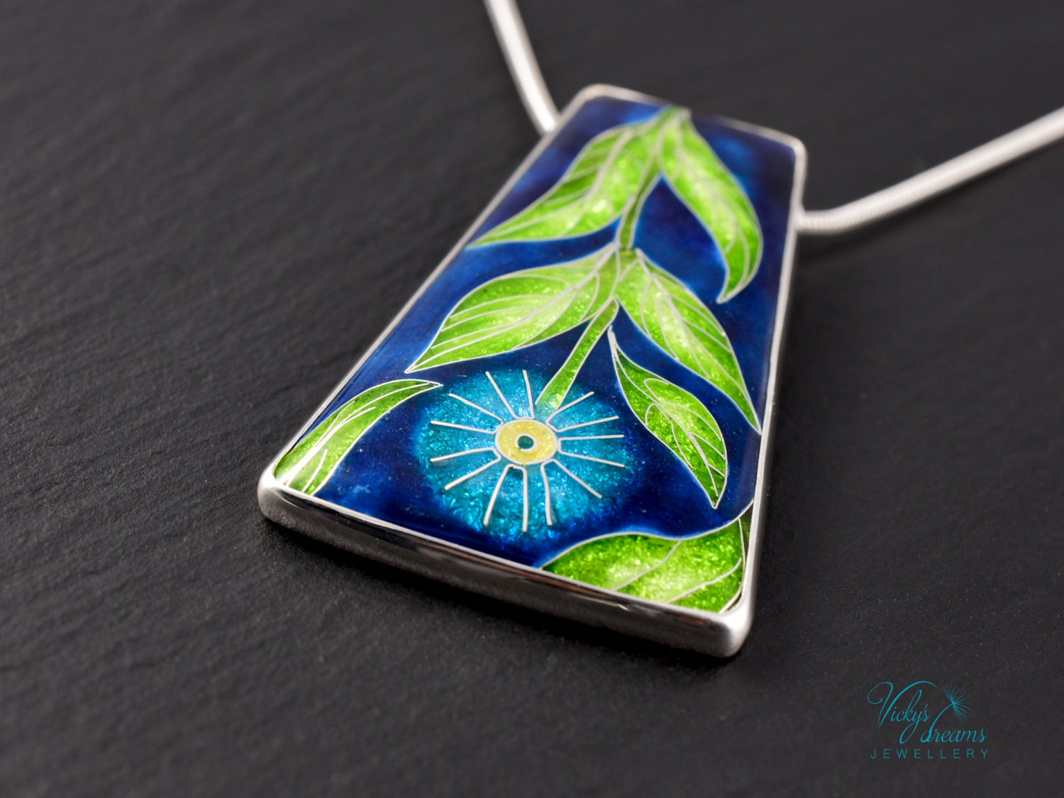 Handmade cloisonné enamel floral pendant on sterling silver necklace, vibrant botanical design